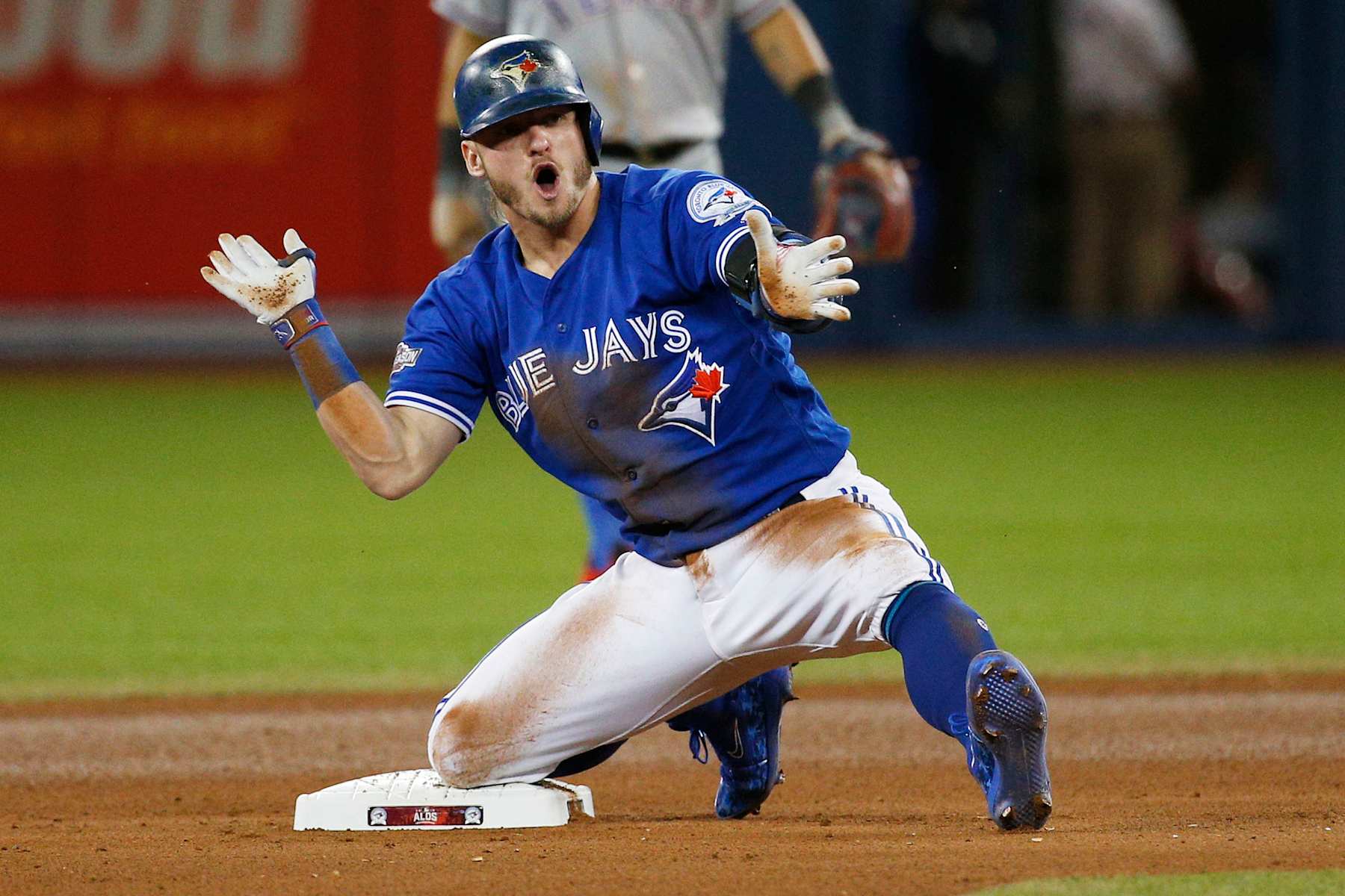 TORONTO, ON - OCTOBER 9  -   Blue Jays Josh Donaldson hits a double during the 10th inning as the Toronto Blue Jays defeated the Texas Rangers 7-6 to advance to the ALCS at Rogers Centre on October 9, 2016.        (Carlos Osorio/Toronto Star via Getty Images)
