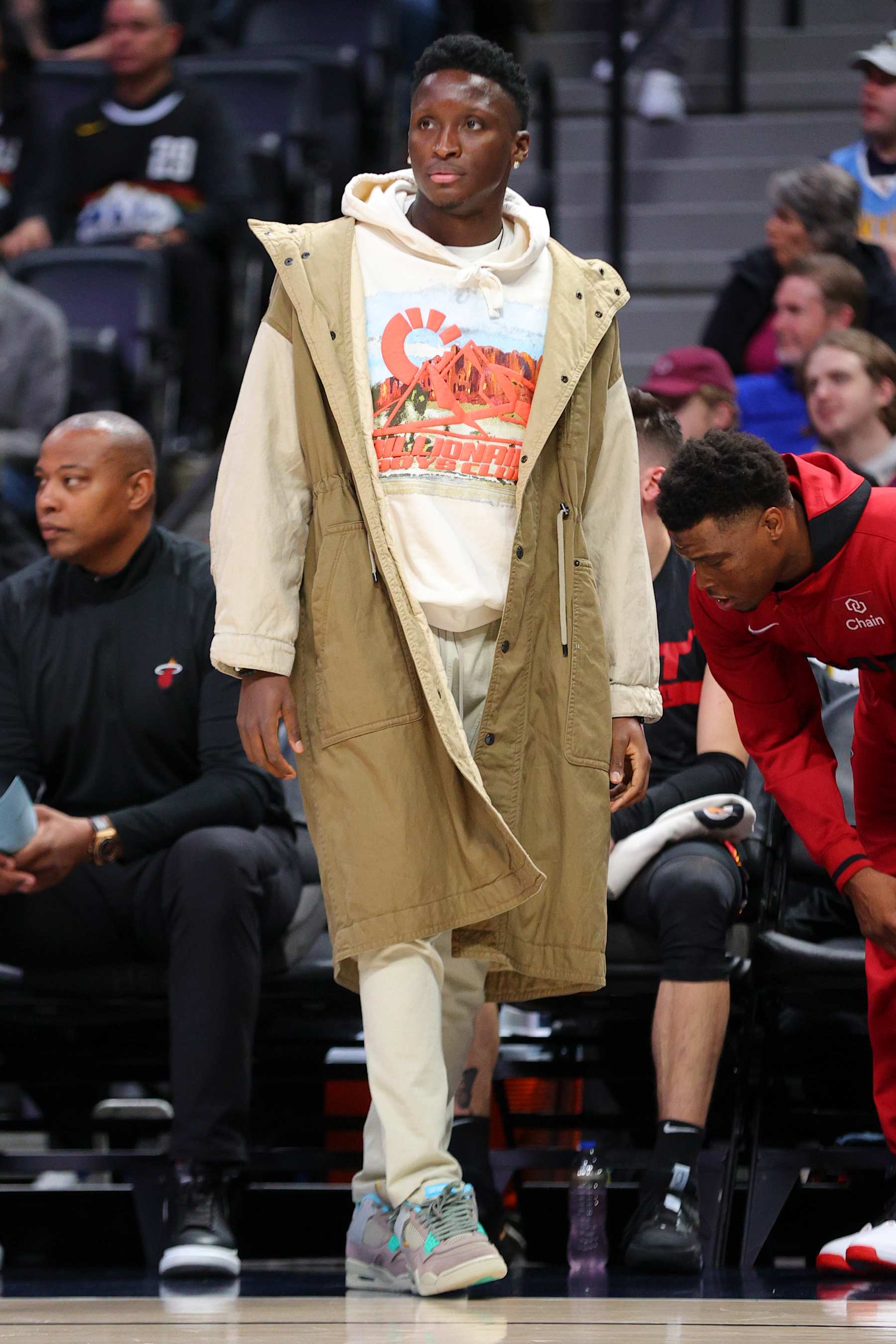 DENVER, CO - DECEMBER 30: Victor Oladipo #4 of the Miami Heat looks on from the bench against the Denver Nuggets during the first quarter at Ball Arena on December 30, 2022 in Denver, Colorado. NOTE TO USER: User expressly acknowledges and agrees that, by downloading and or using this photograph, user is consenting to the terms and conditions of Getty Images License Agreement. Mandatory Copyright Notice: Copyright 2022 NBAE (Photo by C. Morgan Engel/Getty Images)