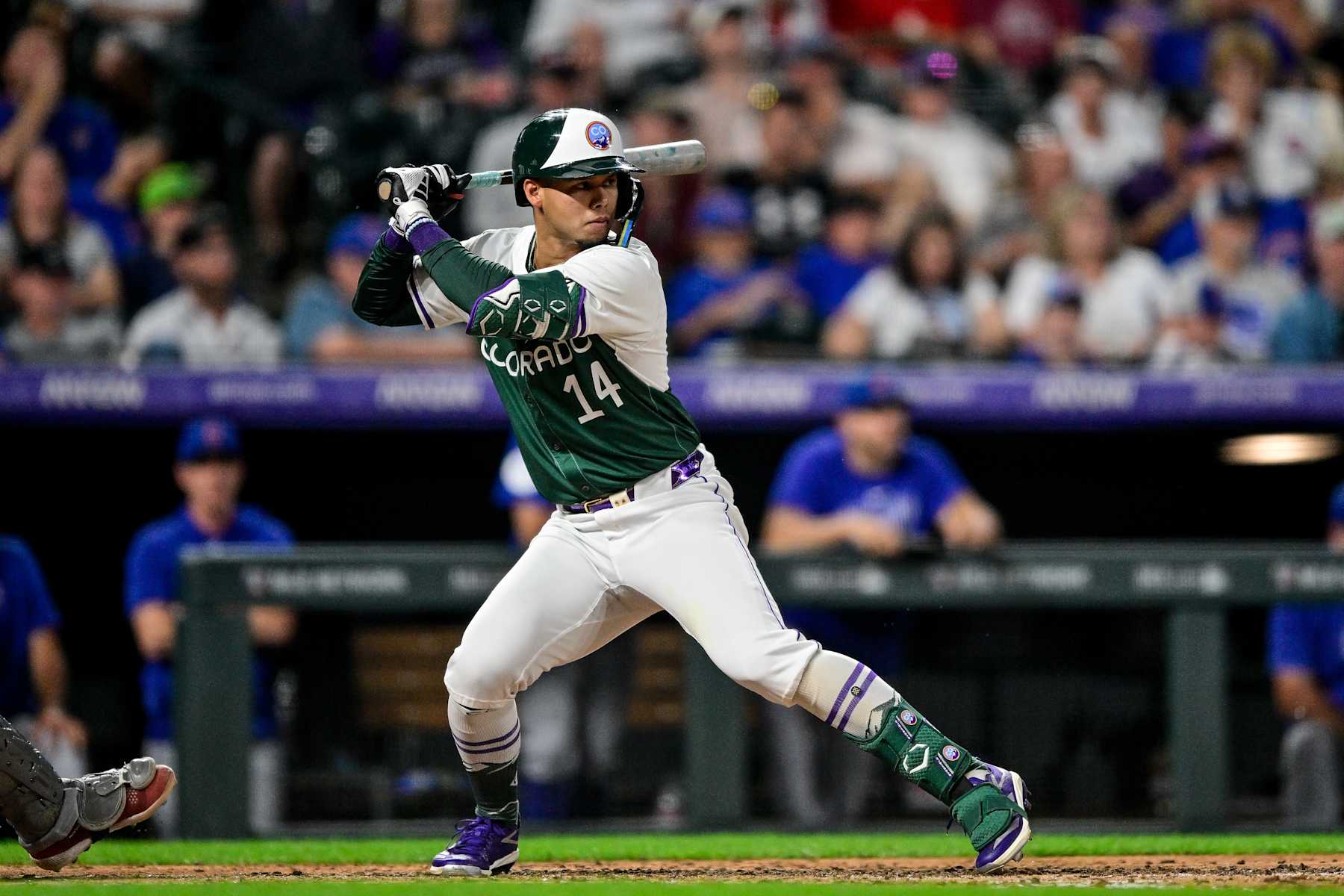 DENVER, COLORADO - SEPTEMBER 14: Ezequiel Tovar #14 of the Colorado Rockies bats in the sixth inning against the Chicago Cubs at Coors Field on September 14, 2024 in Denver, Colorado. (Photo by Dustin Bradford/Getty Images)