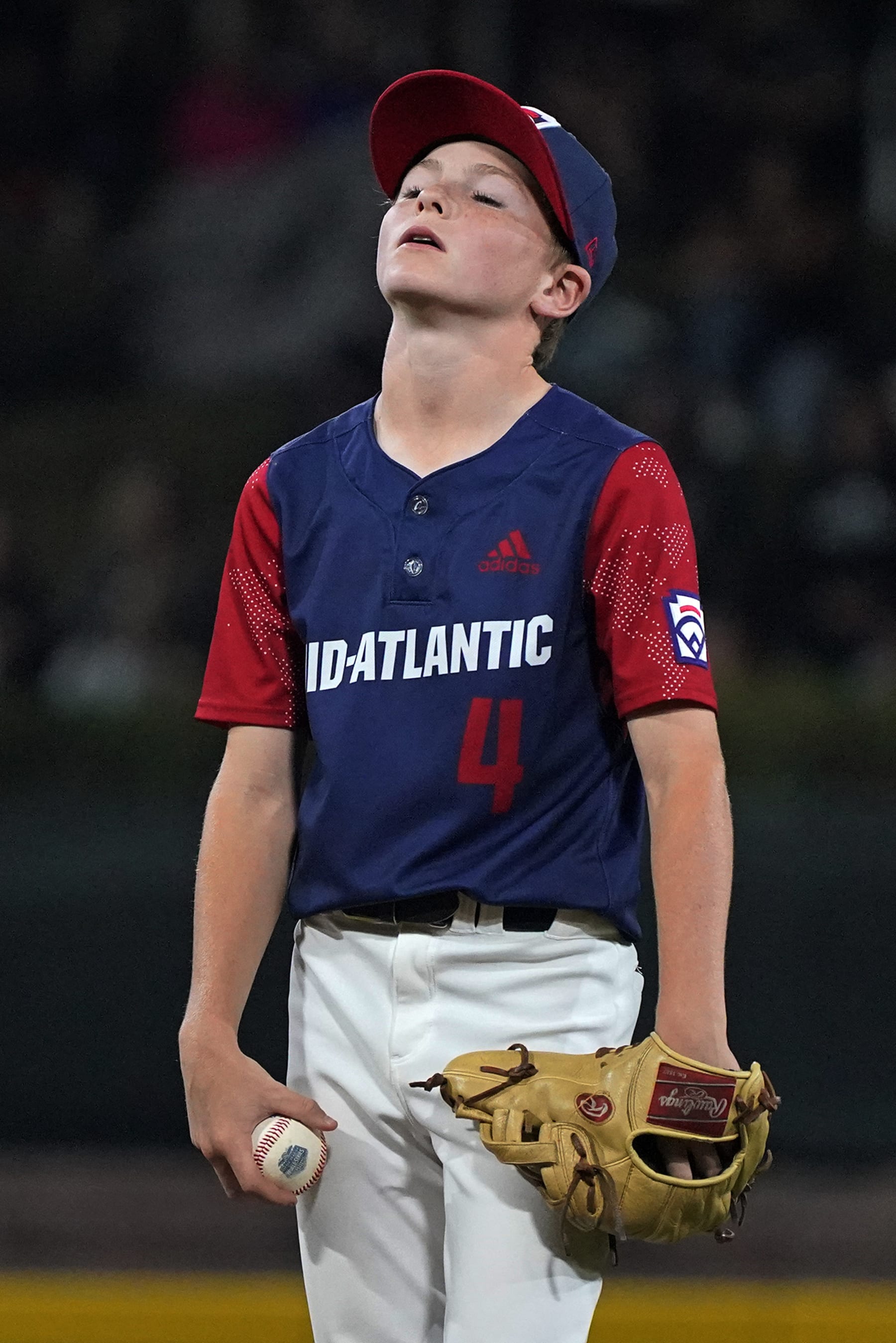 Hollidaysburg, Pa.'s Aspen Anderson collects himself while pitching during the fifth inning of a baseball game against Pearland, Texas, at the Little League World Series in South Williamsport, Pa., Thursday, Aug. 18, 2022. (AP Photo/Gene J. Puskar)