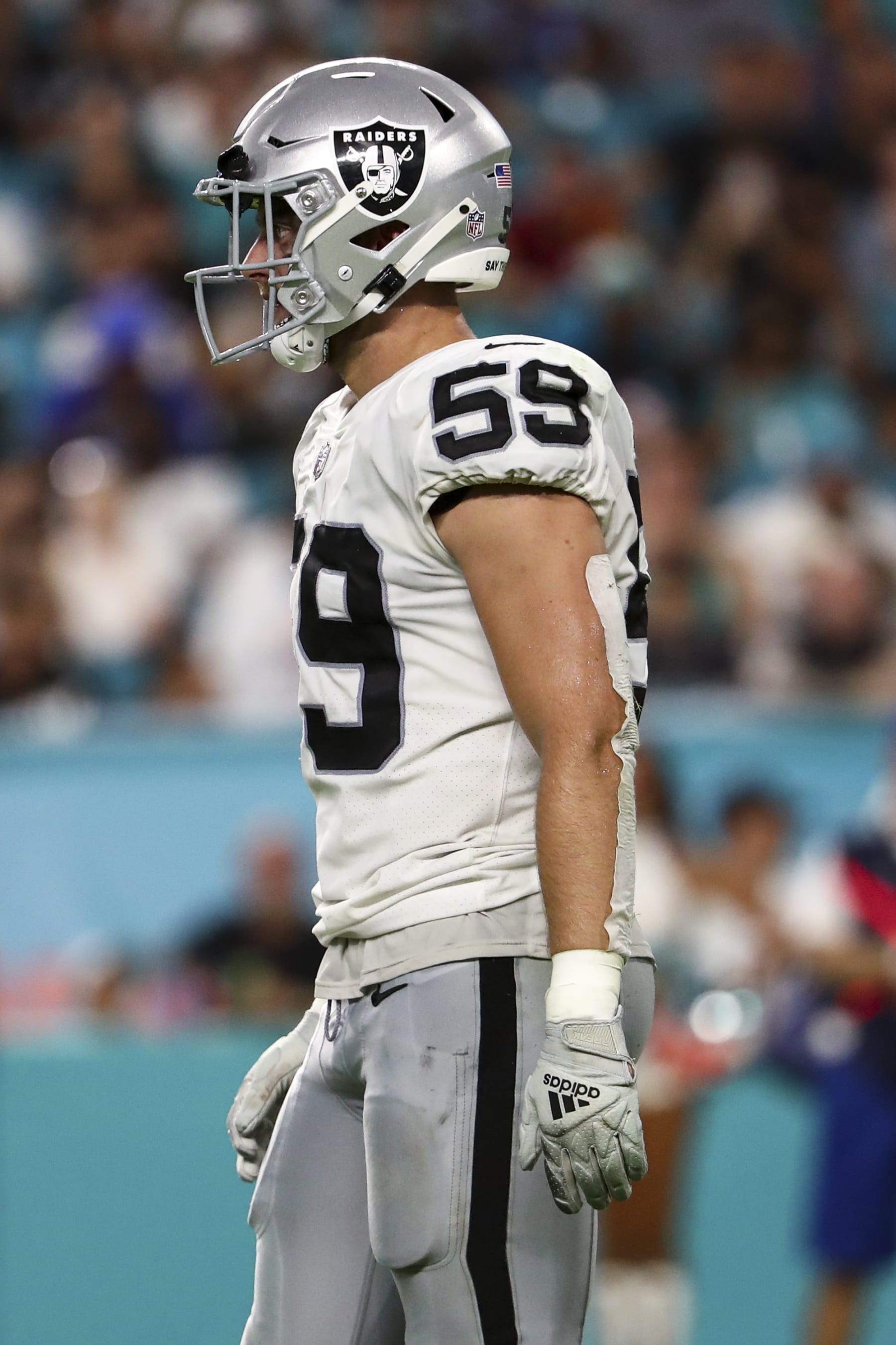 MIAMI GARDENS, FL - AUGUST 20: Luke Masterson #59 of the Las Vegas Raiders looks on during a preseason NFL football game against the Miami Dolphins at Hard Rock Stadium on August 20, 2022 in Miami Gardens, Florida. (Photo by Kevin Sabitus/Getty Images)
