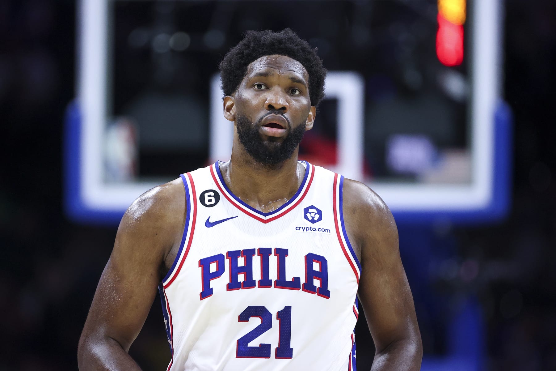 PHILADELPHIA, PENNSYLVANIA - OCTOBER 12: Joel Embiid #21 of the Philadelphia 76ers looks on during the first quarter against the Charlotte Hornets at Wells Fargo Center on October 12, 2022 in Philadelphia, Pennsylvania. NOTE TO USER: User expressly acknowledges and agrees that, by downloading and or using this photograph, User is consenting to the terms and conditions of the Getty Images License Agreement. (Photo by Tim Nwachukwu/Getty Images)