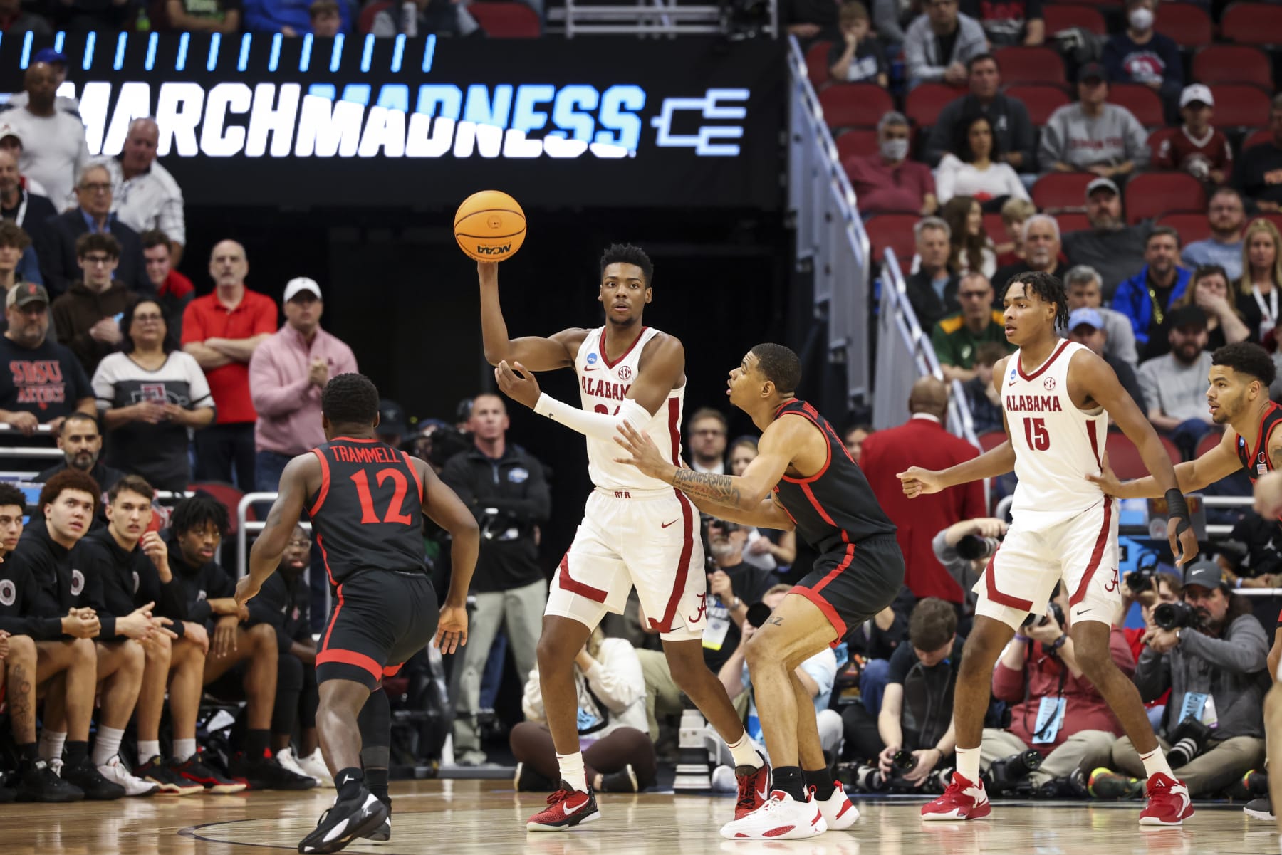 LOUISVILLE, KY - MARCH 24: Brandon Miller #24 of the Alabama Crimson Tide passes the ball against the San Diego State Aztecs during the Sweet Sixteen round of the 2022 NCAA Men's Basketball Tournament held at KFC YUM! Center on March 24, 2023 in Louisville, Kentucky. (Photo by Joe Robbins/NCAA Photos via Getty Images)