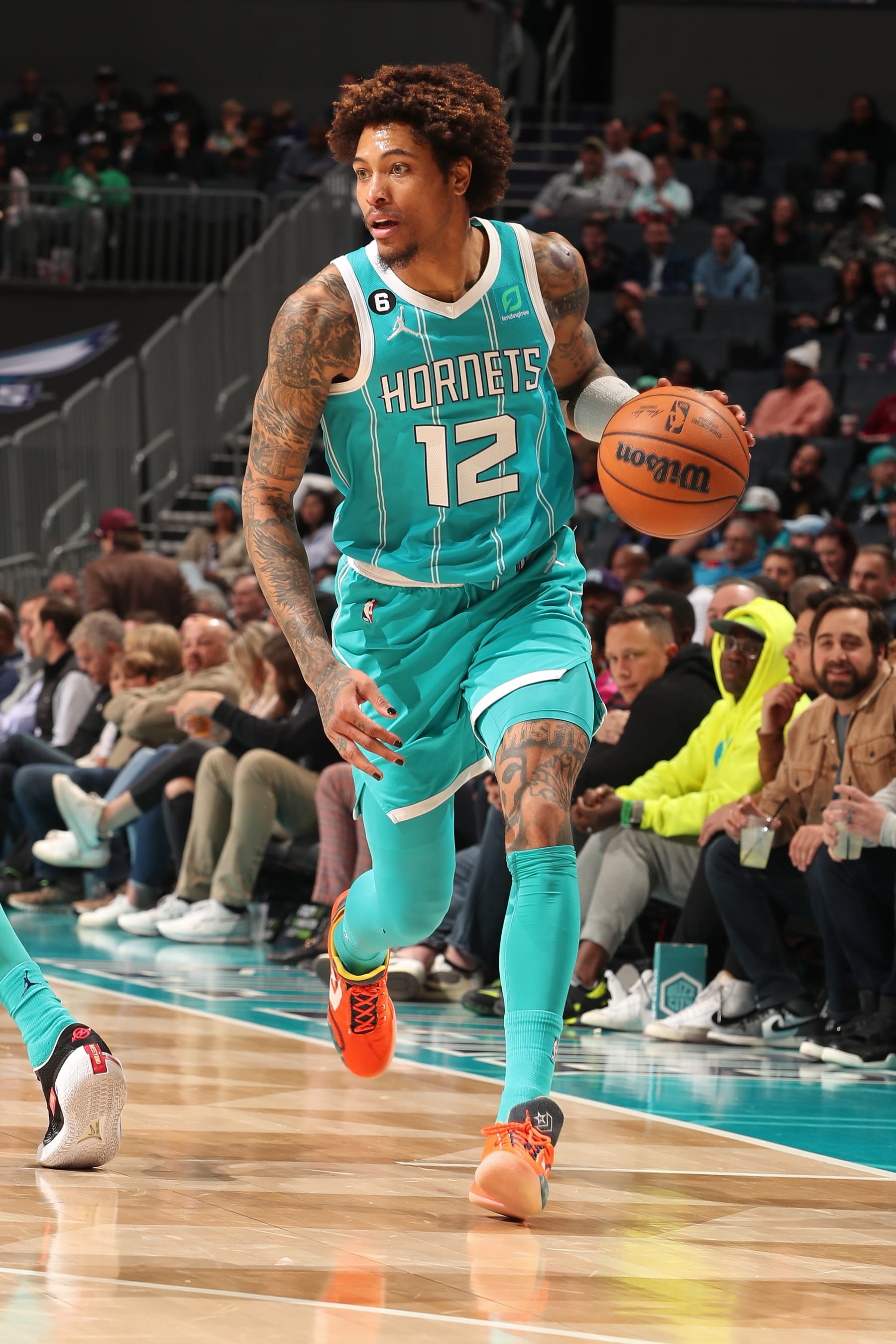 CHARLOTTE, NC - MARCH 20: Kelly Oubre Jr. #12 of the Charlotte Hornets dribbles the ball during the game against the Indiana Pacers on March 20, 2023 at Spectrum Center in Charlotte, North Carolina. NOTE TO USER: User expressly acknowledges and agrees that, by downloading and or using this photograph, User is consenting to the terms and conditions of the Getty Images License Agreement. Mandatory Copyright Notice: Copyright 2023 NBAE (Photo by Kent Smith/NBAE via Getty Images)