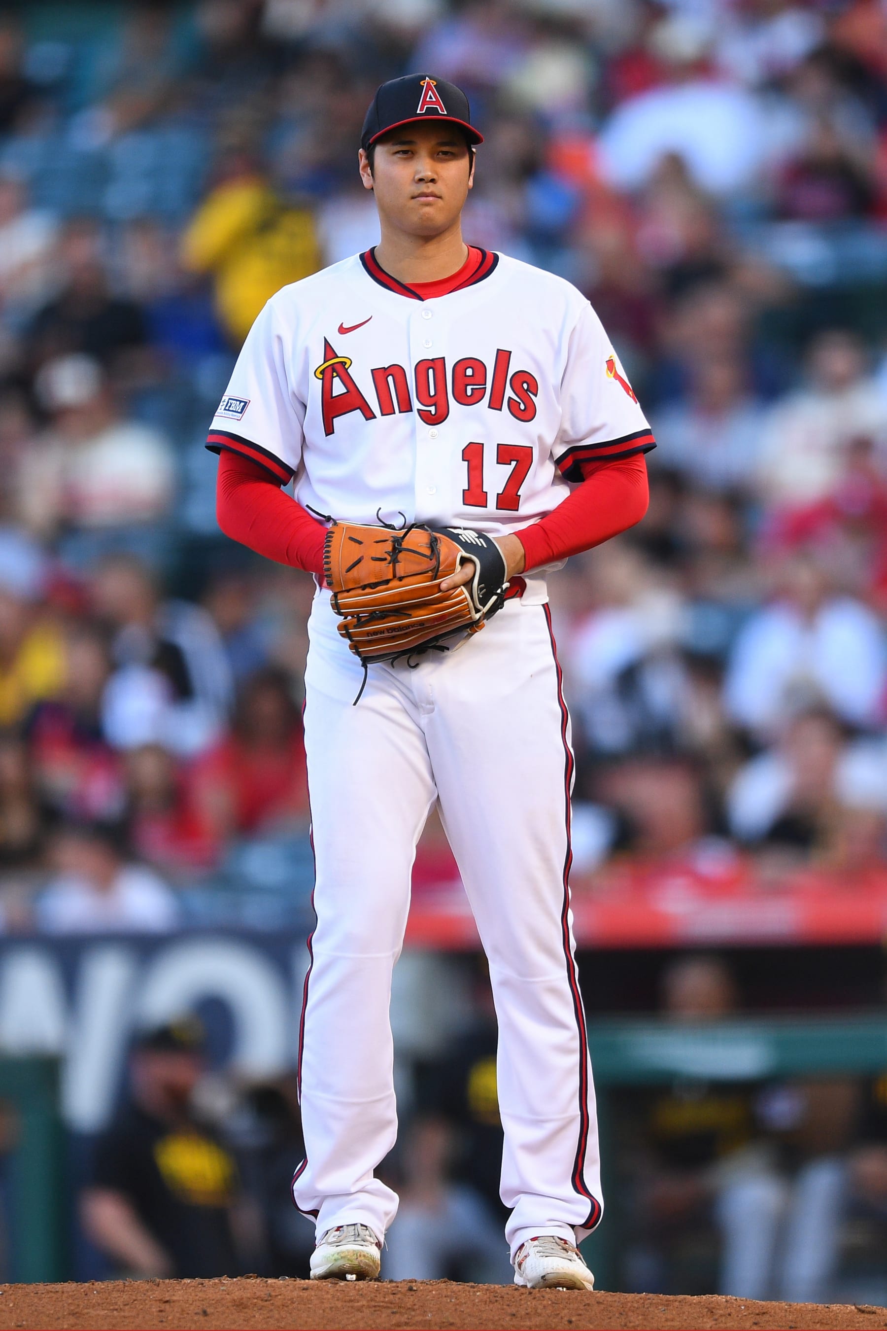 ANAHEIM, CA - JULY 21: Los Angeles Angels pitcher Shohei Ohtani (17) looks on during the MLB game between the Pittsburgh Pirates and the Los Angeles Angels of Anaheim on July 21, 2023 at Angel Stadium of Anaheim in Anaheim, CA. (Photo by Brian Rothmuller/Icon Sportswire via Getty Images)