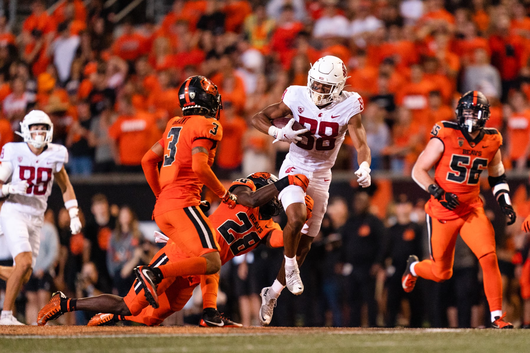 CORVALLIS, OR - OCTOBER 15:  Wide receiver De'zhaun Stribling #88 of the Washington State Cougars rushes the ball during the second half of the game against the Oregon State Beavers at Reser Stadium on October 15, 2022 in Corvallis, Oregon. (Photo by Ali Gradischer/Getty Images)