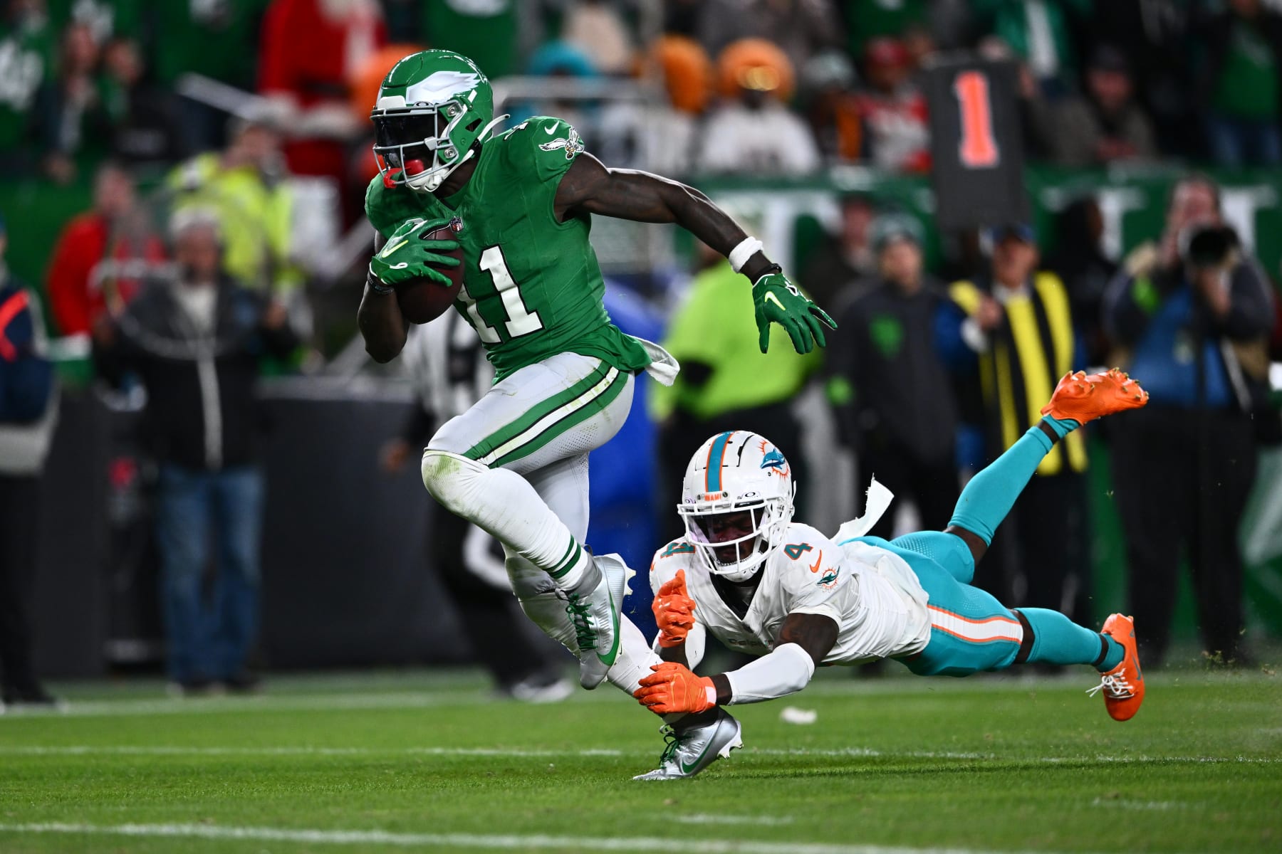 PHILADELPHIA, PA - OCTOBER 22: Philadelphia Eagles Wide Receiver A.J. Brown (11) outruns Miami Dolphins Cornerback Kader Kohou (4) for a touchdown reception in the second half during the game between the Miami Dolphins and Philadelphia Eagles on October 22, 2023 at Lincoln Financial Field in Philadelphia, PA. (Photo by Kyle Ross/Icon Sportswire via Getty Images)