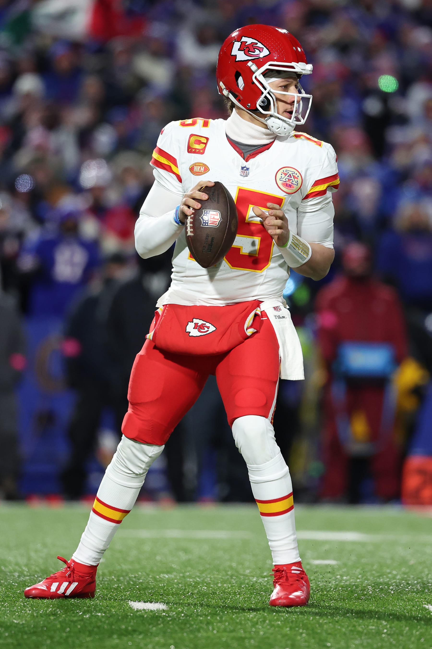 ORCHARD PARK, NEW YORK - JANUARY 21: Patrick Mahomes #15 of the Kansas City Chiefs looks to pass against the Buffalo Bills during the first quarter in the AFC Divisional Playoff game at Highmark Stadium on January 21, 2024 in Orchard Park, New York. (Photo by Al Bello/Getty Images)