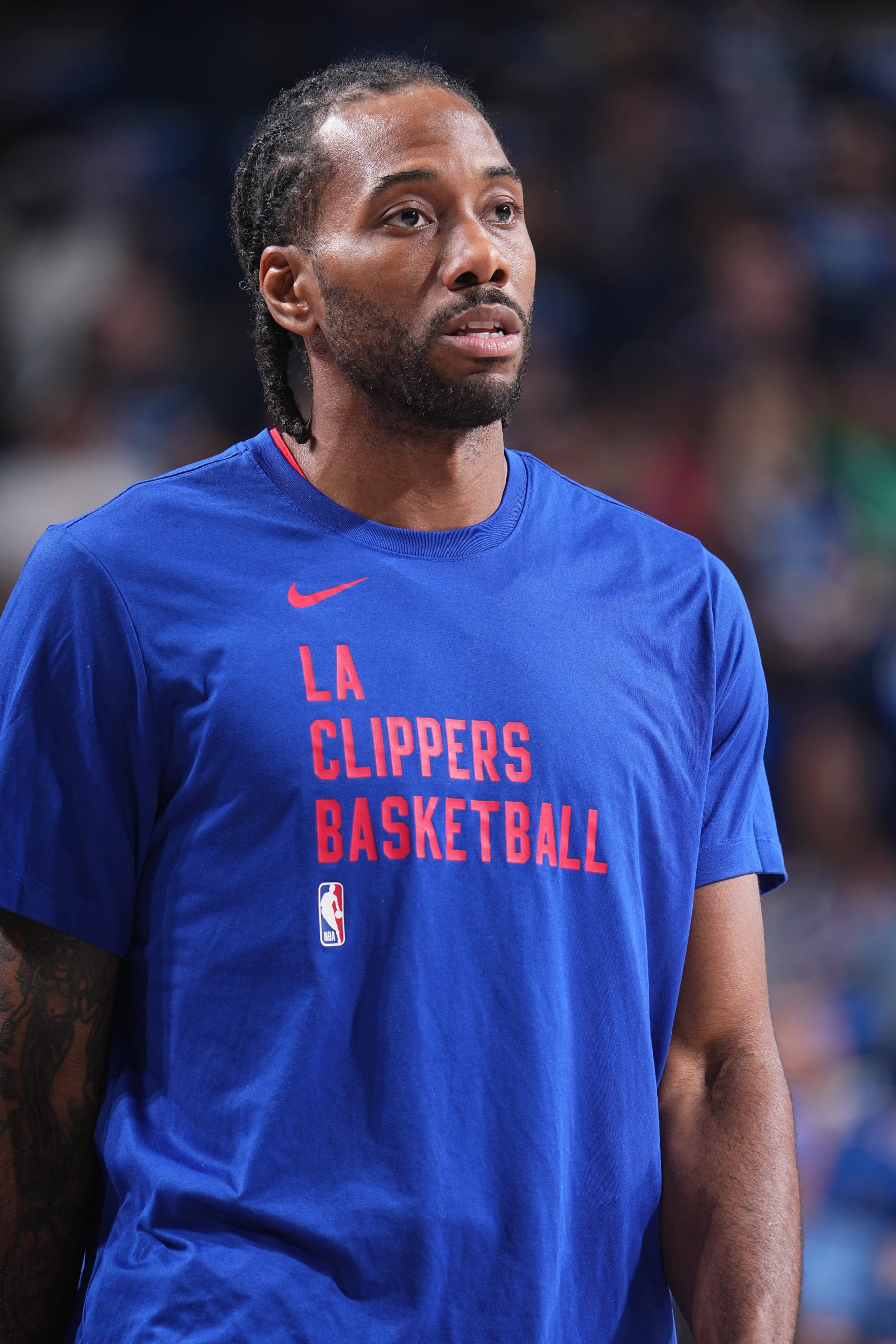 DALLAS, TX - APRIL 26: Kawhi Leonard #2 of the LA Clippers looks on before the game against the Dallas Mavericks during Round 1 Game 3 of the 2024 NBA Playoffs on April 26, 2024 at the American Airlines Center in Dallas, Texas. NOTE TO USER: User expressly acknowledges and agrees that, by downloading and or using this photograph, User is consenting to the terms and conditions of the Getty Images License Agreement. Mandatory Copyright Notice: Copyright 2023 NBAE (Photo by Glenn James/NBAE via Getty Images)