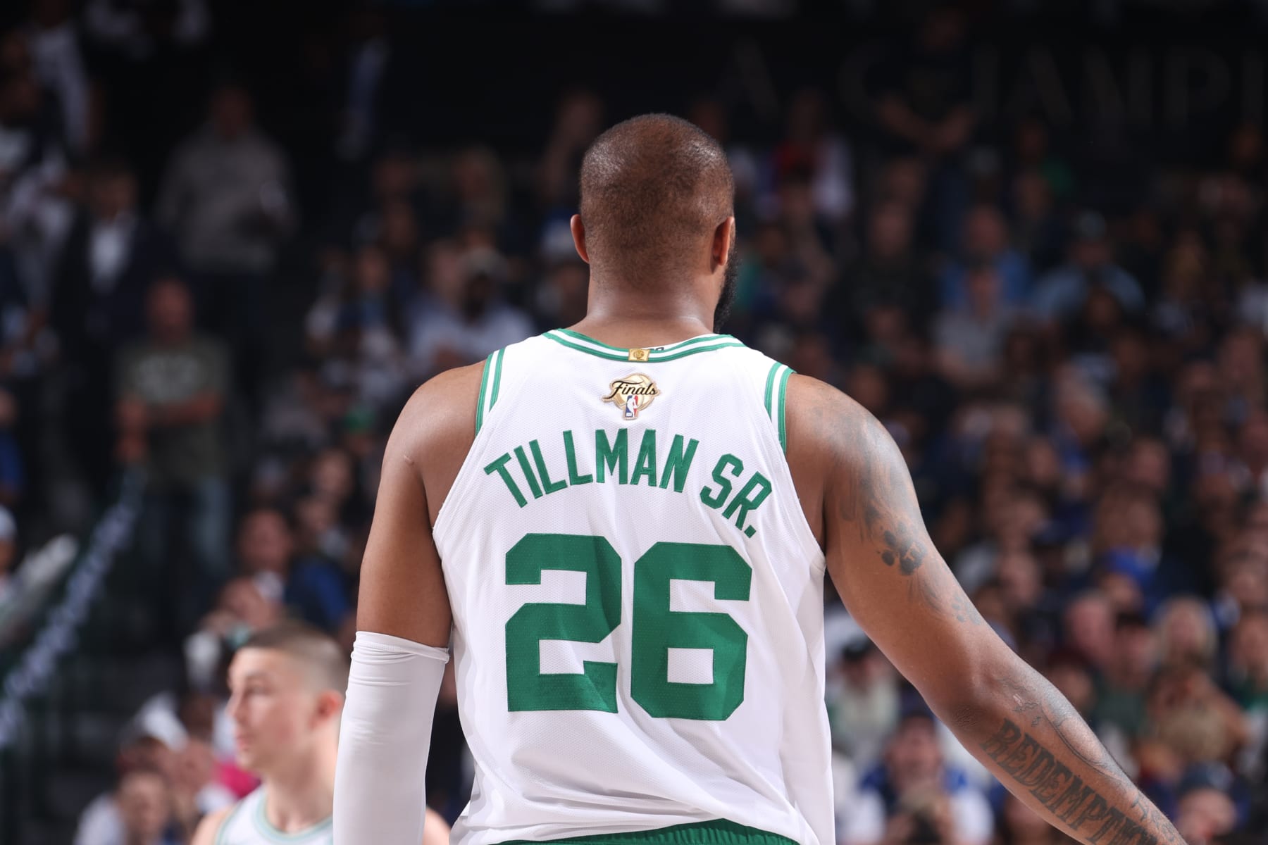 DALLAS, TX - JUNE 12: Xavier Tillman #26 of the Boston Celtics looks on during the game against the Dallas Mavericks during Game 3 of the 2024 NBA Finals on June 12, 2024 at the American Airlines Center in Dallas, Texas. NOTE TO USER: User expressly acknowledges and agrees that, by downloading and or using this photograph, User is consenting to the terms and conditions of the Getty Images License Agreement. Mandatory Copyright Notice: Copyright 2024 NBAE (Photo by Nathaniel S. Butler/NBAE via Getty Images)