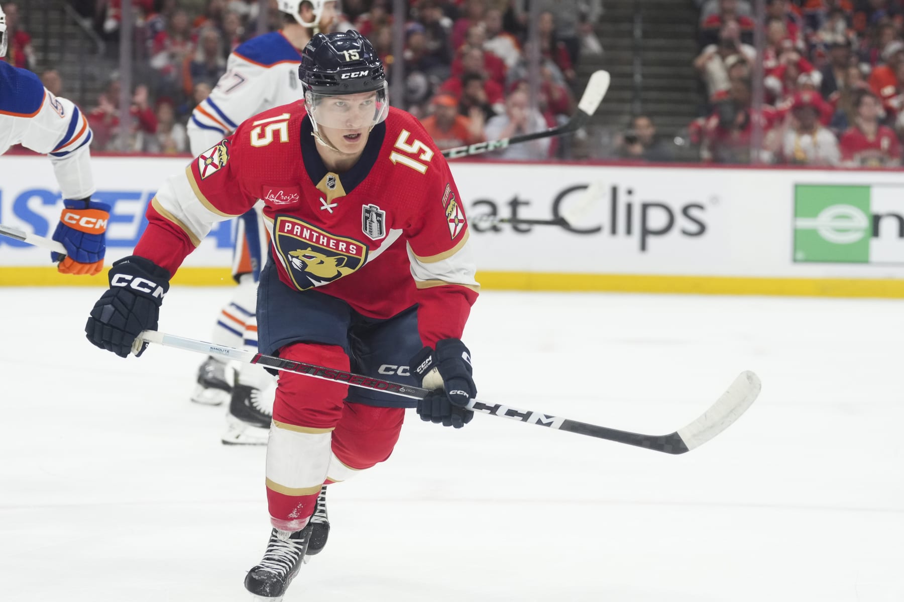 SUNRISE, FL - JUNE 24: Florida Panthers center Anton Lundell (15) looks toward the puck in the first period during game seven of the Stanley Cup Finals between the Edmonton Oilers and the Florida Panthers on Monday, June 24, 2024  at Amerant Bank Arena in Sunrise, Fla. (Photo by Peter Joneleit/Icon Sportswire via Getty Images)