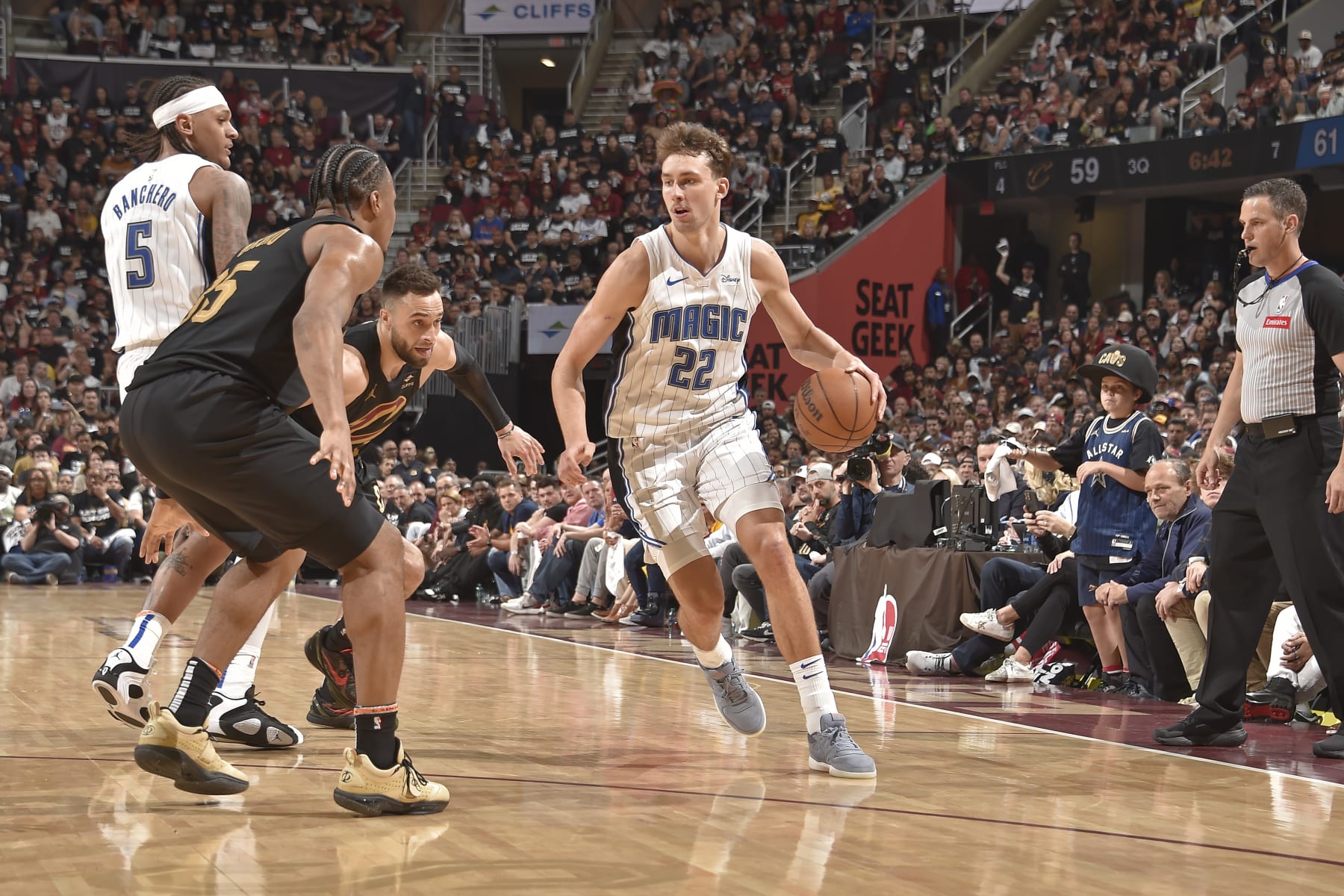 CLEVELAND, OH - MAY 5: Franz Wagner #22 of the Orlando Magic handles the ball during the game against the Cleveland Cavaliers during Round 1 Game 7 of the 2024 NBA Playoffs on May 5, 2024 at Rocket Mortgage FieldHouse in Cleveland, Ohio. NOTE TO USER: User expressly acknowledges and agrees that, by downloading and/or using this Photograph, user is consenting to the terms and conditions of the Getty Images License Agreement. Mandatory Copyright Notice: Copyright 2024 NBAE (Photo by David Liam Kyle/NBAE via Getty Images)