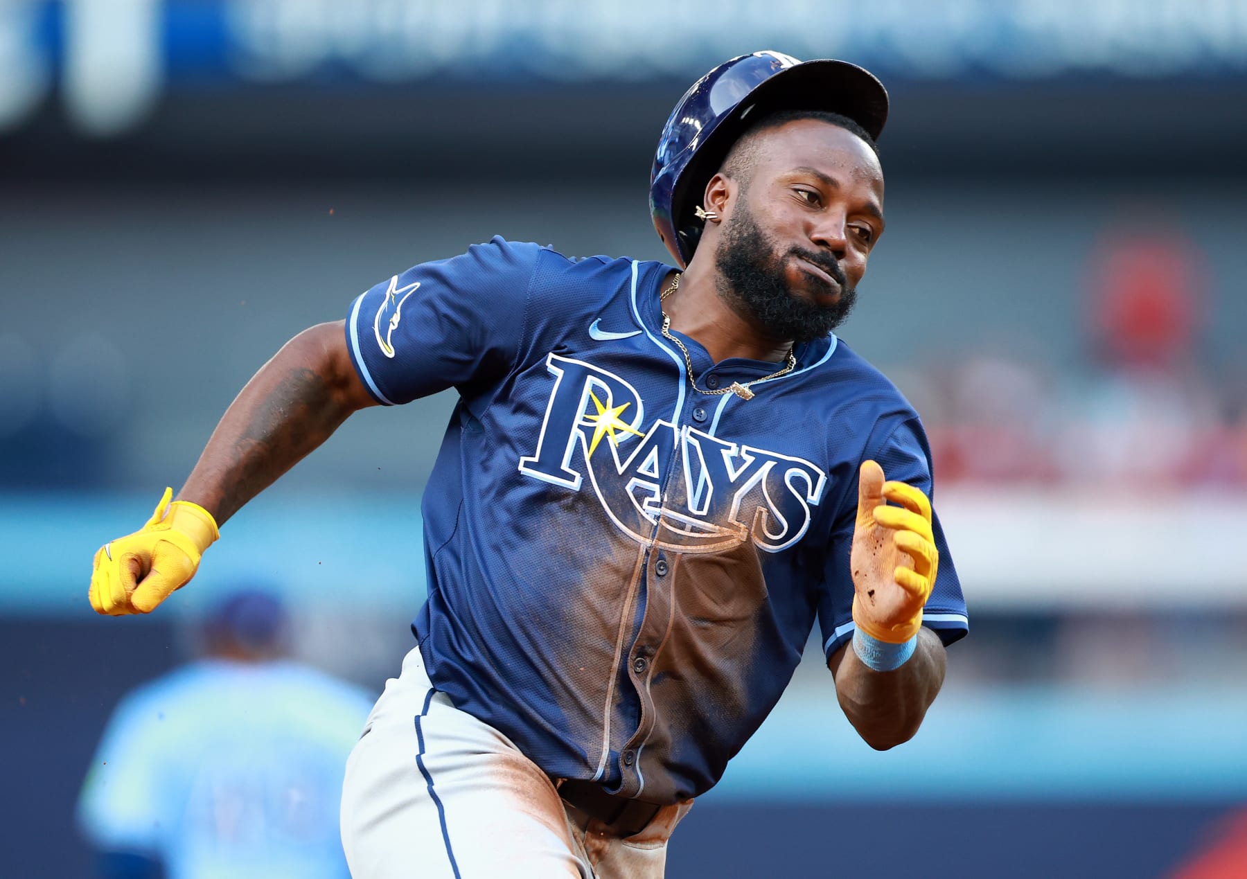 TORONTO, ON - JUNE 23:  Randy Arozarena #56 of the Tampa Bay Rays rounds third base to score a run on a single by Josh Lowe #15 in the first inning during a game against the Toronto Blue Jays at Rogers Centre on June 23, 2024 in Toronto, Ontario, Canada.  (Photo by Vaughn Ridley/Getty Images)