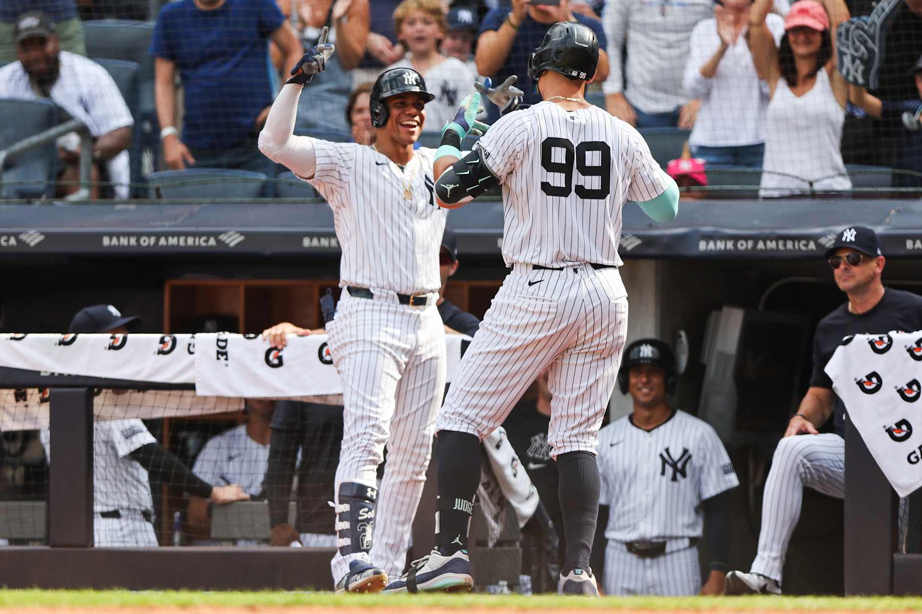 BRONX, NY - AUGUST 25: New York Yankees outfielder Aaron Judge (99) celebrates with New York Yankees outfielder Juan Soto (22) after hitting a home run during a Major League Baseball game between the Colorado Rockies and New York Yankees on August 25, 2024 at Yankee Stadium in the Bronx, New York.