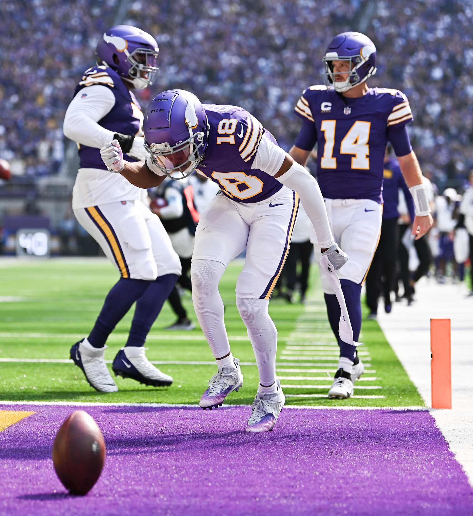 MINNEAPOLIS, MINNESOTA - SEPTEMBER 22: Justin Jefferson #18 of the Minnesota Vikings celebrates after scoring a touchdown in the first quarter of the game against the Houston Texans at U.S. Bank Stadium on September 22, 2024 in Minneapolis, Minnesota. (Photo by Stephen Maturen/Getty Images)