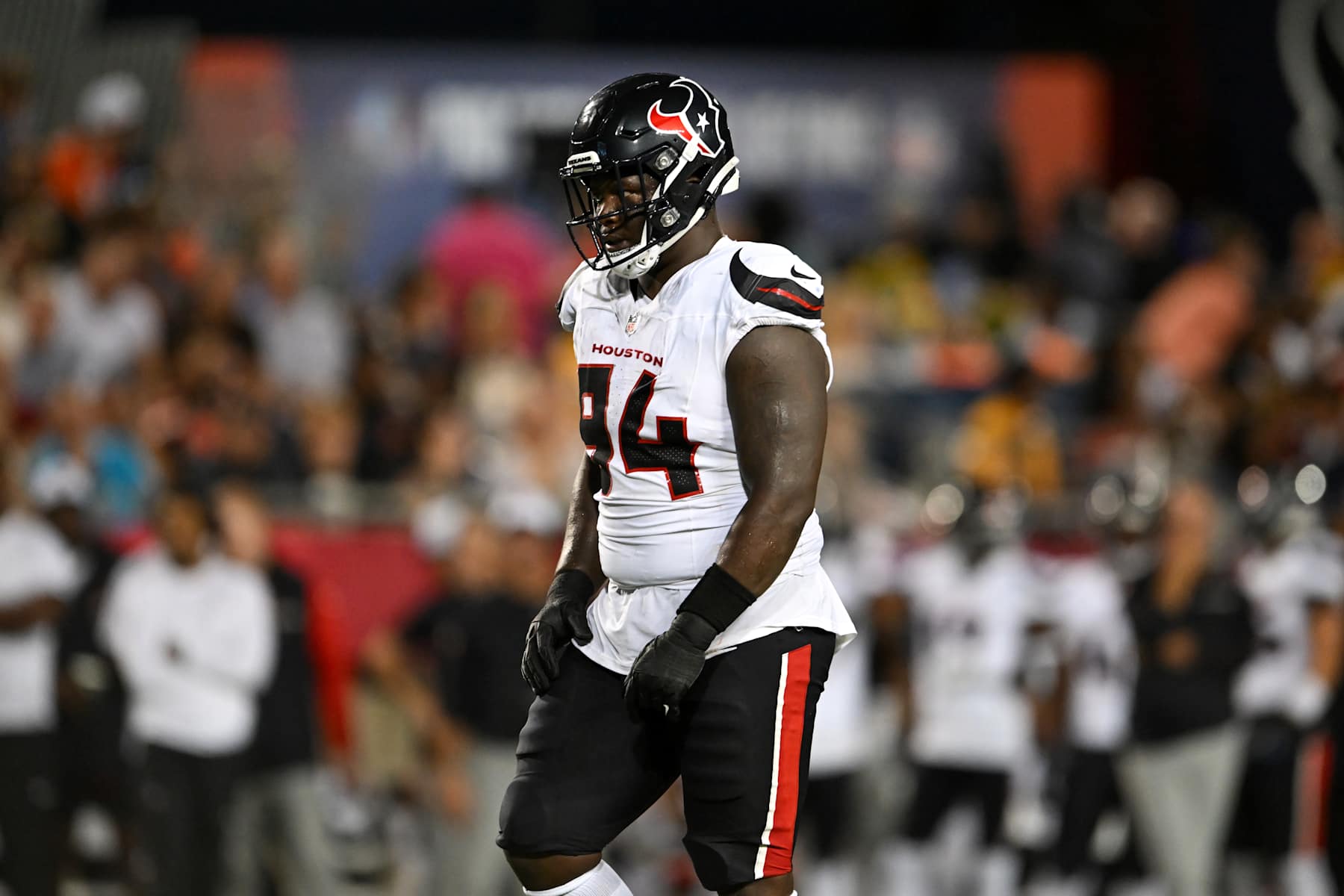 CANTON, OHIO - AUGUST 01: Khalil Davis #94 of the Houston Texans looks on during the first half of the 2024 Pro Football Hall of Fame Game against the Chicago Bears at Tom Benson Hall Of Fame Stadium on August 01, 2024 in Canton, Ohio. (Photo by Nick Cammett/Diamond Images via Getty Images)