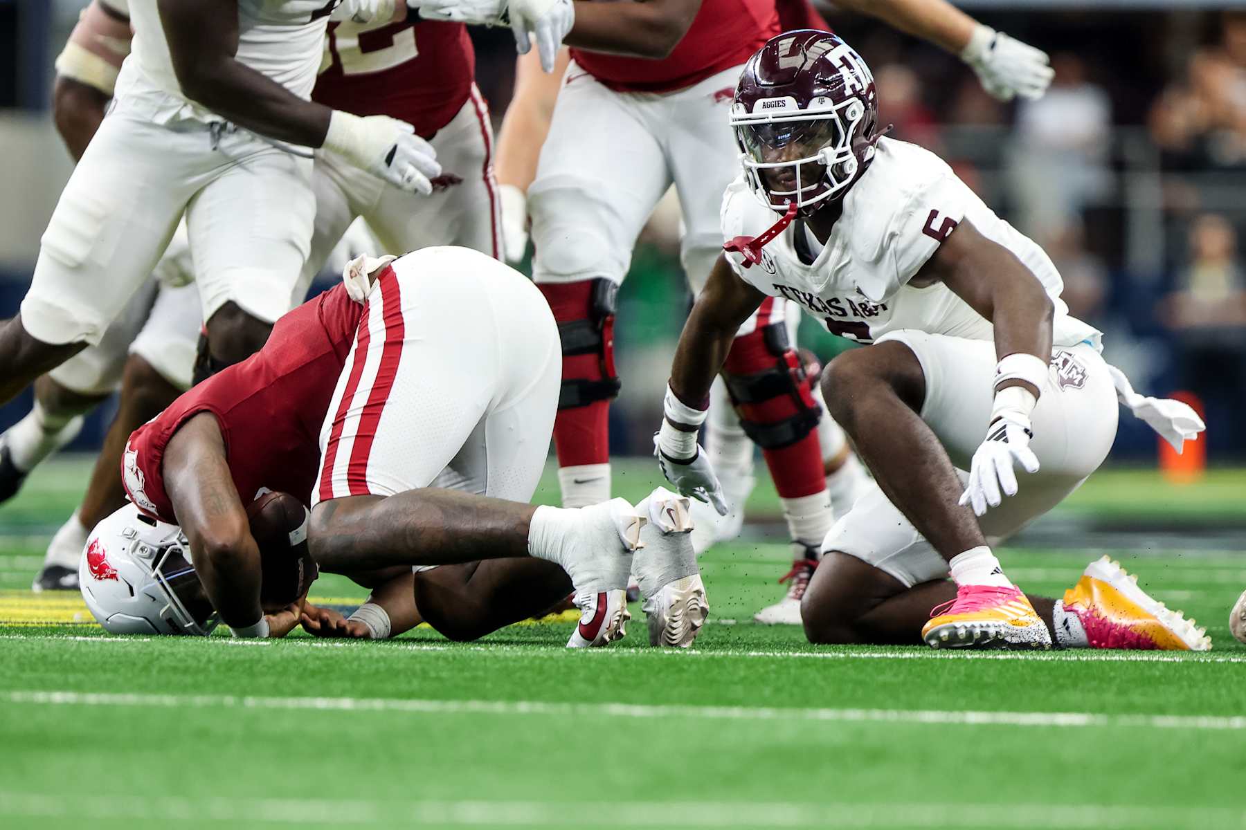ARLINGTON, TX - SEPTEMBER 30: Defensive lineman Enai White #6 of the Texas A&M Aggies celebrates his sack during a game between the University of Arkansas Razorbacks and Texas A&M Aggies at AT&T Stadium on September 30, 2023 in Arlington, Texas. (Photo by Aric Becker/ISI Photos via Getty Images)