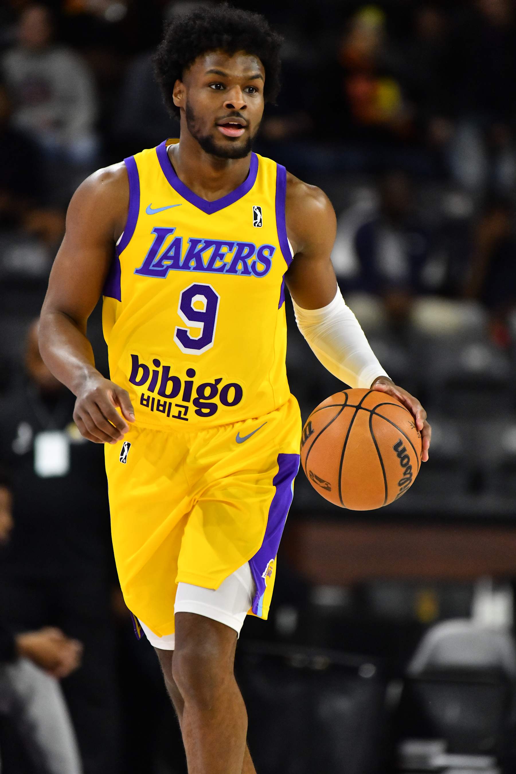 TEMPE, AZ - Bronny James #9 of the South Bay Lakers dribbles the ball against the Valley Suns on December 12, 2024, at Mullett Arena in Tempe, Arizona. NOTE TO USER: User expressly acknowledges and agrees that, by downloading and or using this photograph, user is consenting to the terms and conditions of the Getty Images License Agreement. Mandatory Copyright Notice: Copyright 2024 NBAE (Photo by Barry Gossage / NBAE via Getty Images)