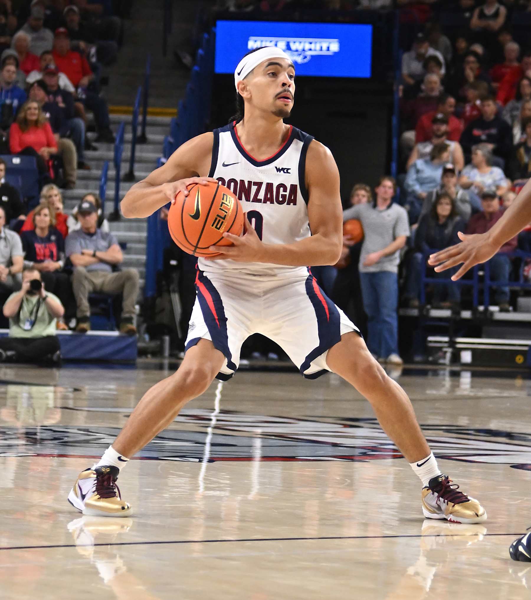 SPOKANE, WASHINGTON - DECEMBER 21:  Ryan Nembhard #0 of the Gonzaga Bulldogs eyes the court during the second half of the game against the Bucknell Bison at McCarthey Athletic Center on December 21, 2024 in Spokane, Washington. (Photo by Robert Johnson/Getty Images)
