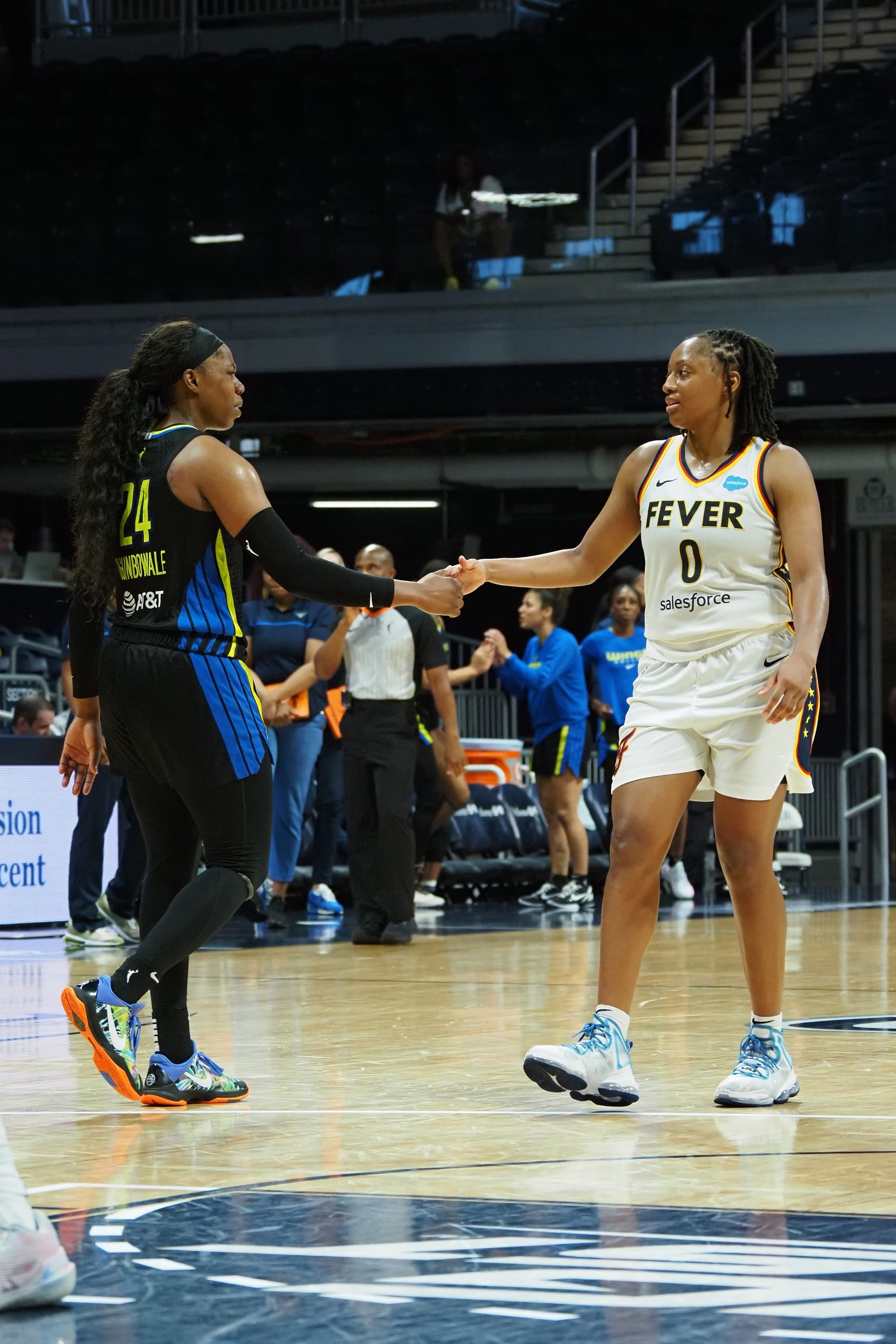 INDIANAPOLIS, IN - JULY 24: Arike Ogunbowale #24 of the Dallas Wings and Kelsey Mitchell #0 of the Indiana Fever talk after the game on July 24, 2022 at Gainbridge Fieldhouse in Indianapolis, Indiana. NOTE TO USER: User expressly acknowledges and agrees that, by downloading and or using this Photograph, user is consenting to the terms and conditions of the Getty Images License Agreement. Mandatory Copyright Notice: Copyright 2022 NBAE (Photo by Ron Hoskins/NBAE via Getty Images)