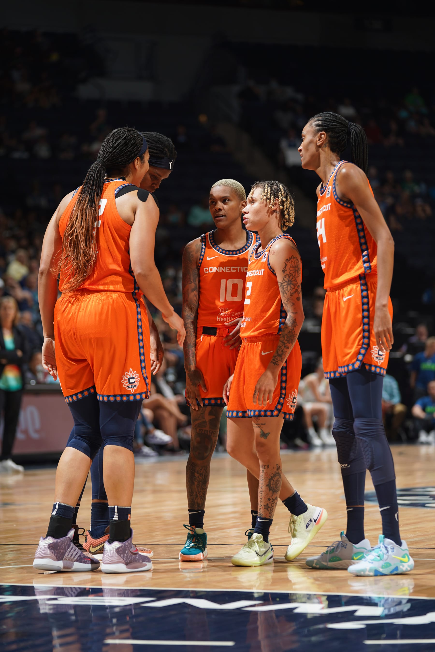 MINNEAPOLIS, MN - JULY 24: The Connecticut Sun huddle up during the game against the Minnesota Lynx on July 24, 2022 at Target Center in Minneapolis, Minnesota. NOTE TO USER: User expressly acknowledges and agrees that, by downloading and/or using this Photograph, user is consenting to the terms and conditions of the Getty Images License Agreement. Mandatory Copyright Notice: Copyright 2022 NBAE (Photo by Jordan Johnson/NBAE via Getty Images)