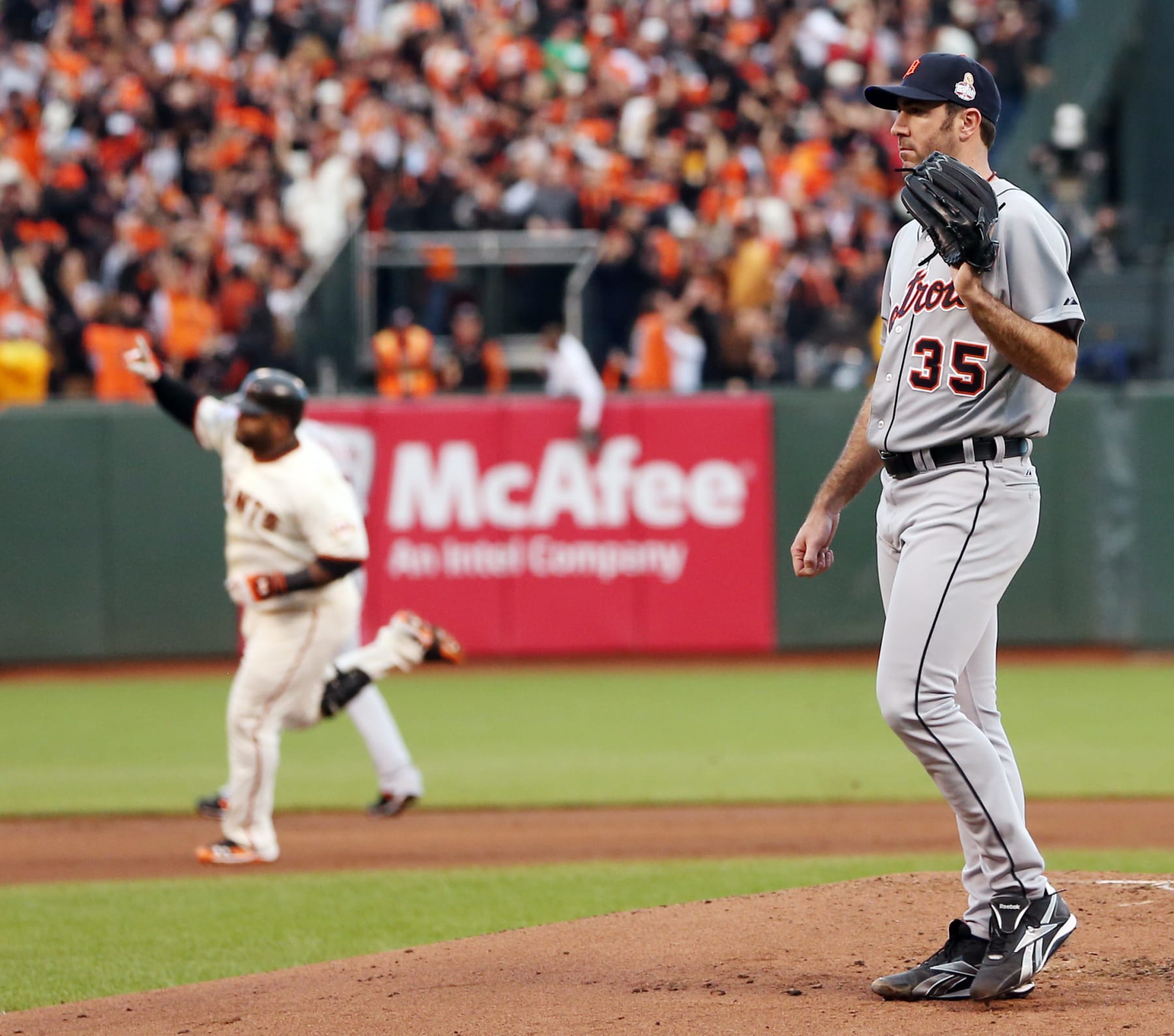 Detroit Tigers starting pitcher Justin Verlander waits for a new ball as San Francisco Giants' Pablo Sandoval rounds the bases after hitting a home run during the first inning of Game 1 of baseball's World Series Wednesday, Oct. 24, 2012, in San Francisco. (AP Photo/Ezra Shaw, Pool)