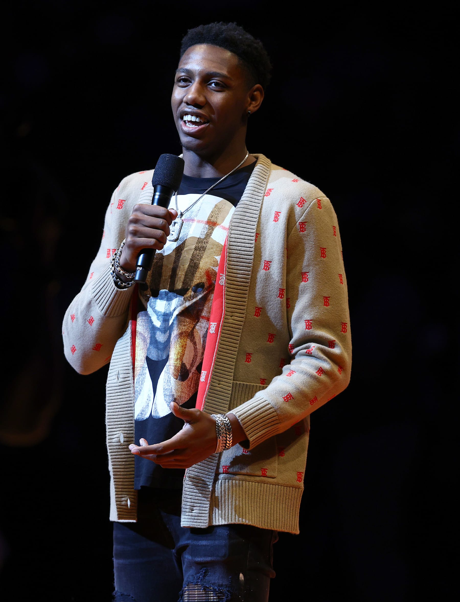 NEW YORK, NEW YORK - APRIL 10: RJ Barrett #9 of the New York Knicks addresses the crowd before the game against the Toronto Raptors at Madison Square Garden on April 10, 2022 in New York City. NOTE TO USER: User expressly acknowledges and agrees that, by downloading and or using this photograph, User is consenting to the terms and conditions of the Getty Images License Agreement. (Photo by Elsa/Getty Images)