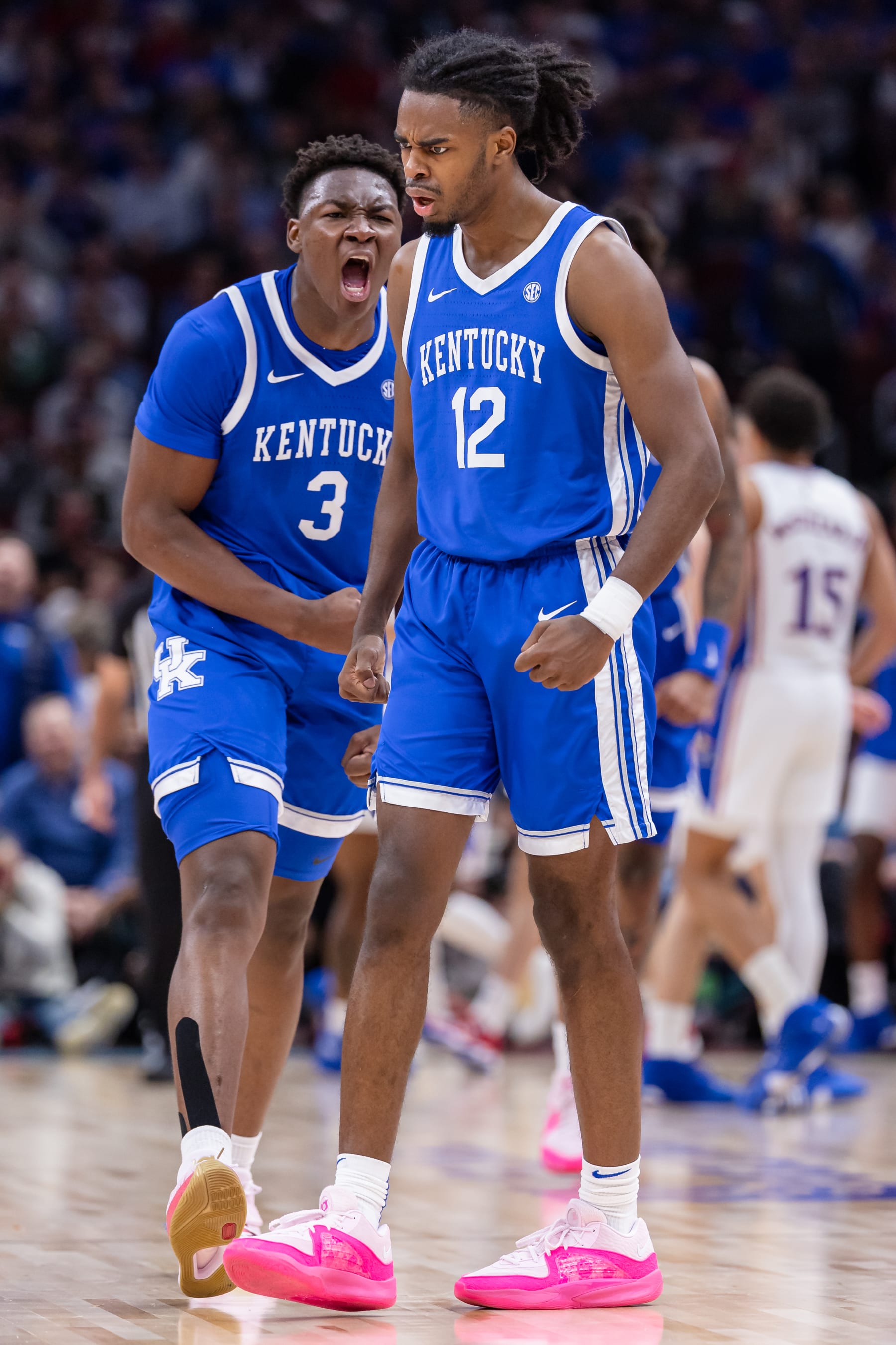 Kentucky's Antonio Reeves (12) and Adou Thiero (3)