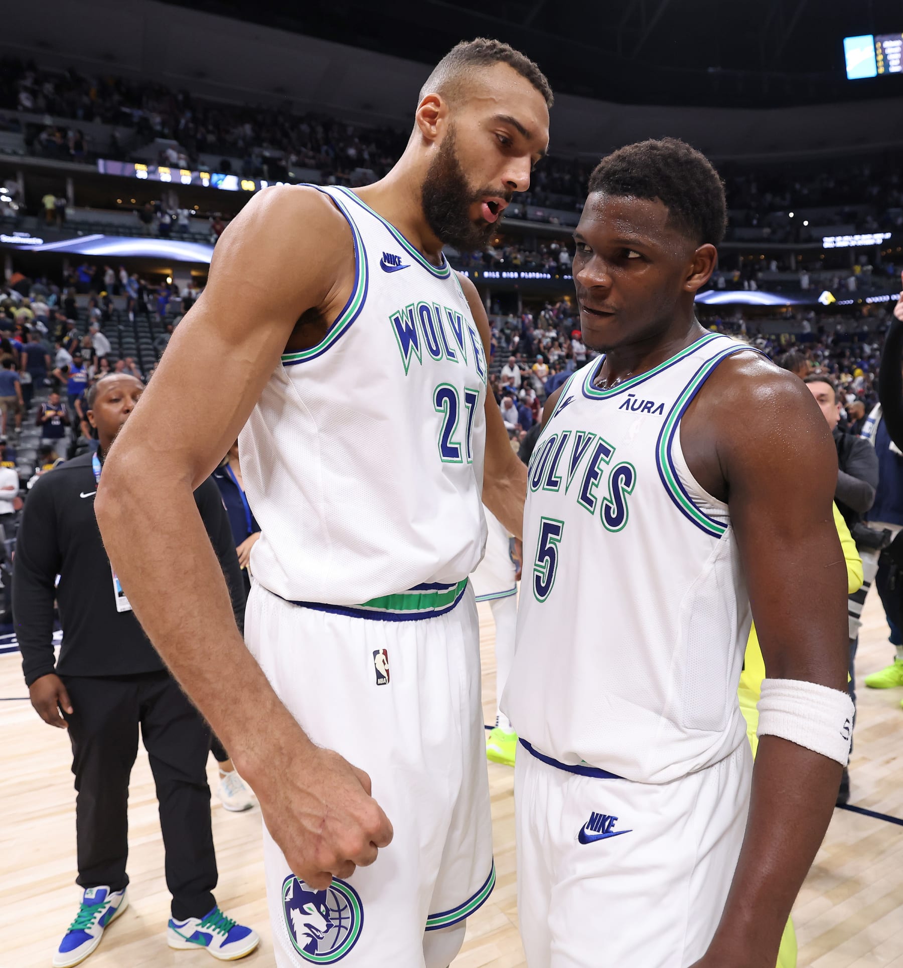 DENVER, CO - MAY 19: Rudy Gobert #27 and Anthony Edwards #5 of the Minnesota Timberwolves celebrate after the game against the Denver Nuggets during Round 2 Game 7 of the 2024 NBA Playoffs on May 19, 2024 at the Ball Arena in Denver, Colorado. NOTE TO USER: User expressly acknowledges and agrees that, by downloading and/or using this Photograph, user is consenting to the terms and conditions of the Getty Images License Agreement. Mandatory Copyright Notice: Copyright 2023 NBAE (Photo by David Sherman/NBAE via Getty Images)
