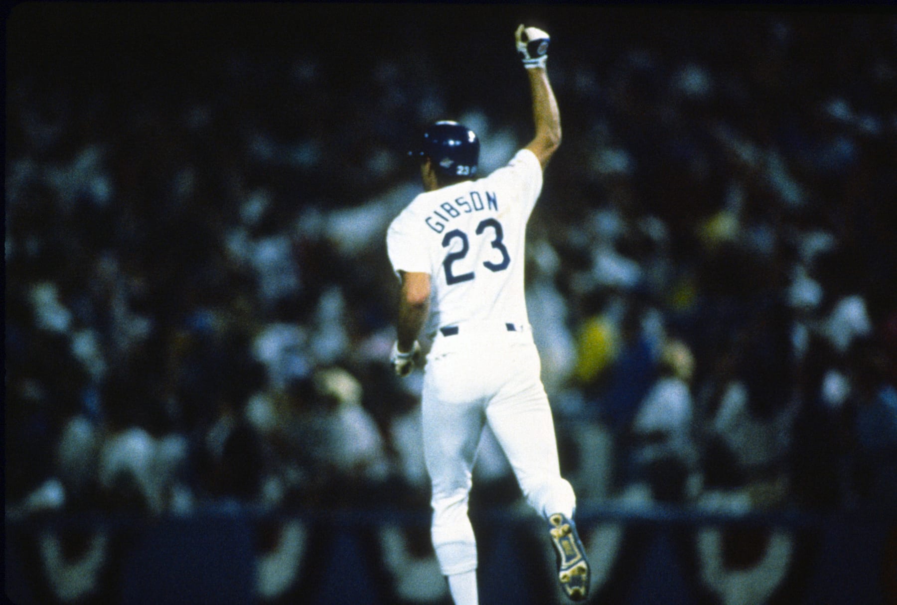 LOS ANGELES, CA - OCTOBER 15: Kirk Gibson #23 of the Los Angeles Dodgers celebrates as he trots around the bases after hitting a game winning pitch-hit solo home run in the bottom of the ninth inning of game one against the Oakland Athletics during the 1988 World Series, October 15, 1988 at Dodger Stadium in Los Angeles, California. The Dodgers won the series 4-1. (Photo by Focus on Sport/Getty Images)