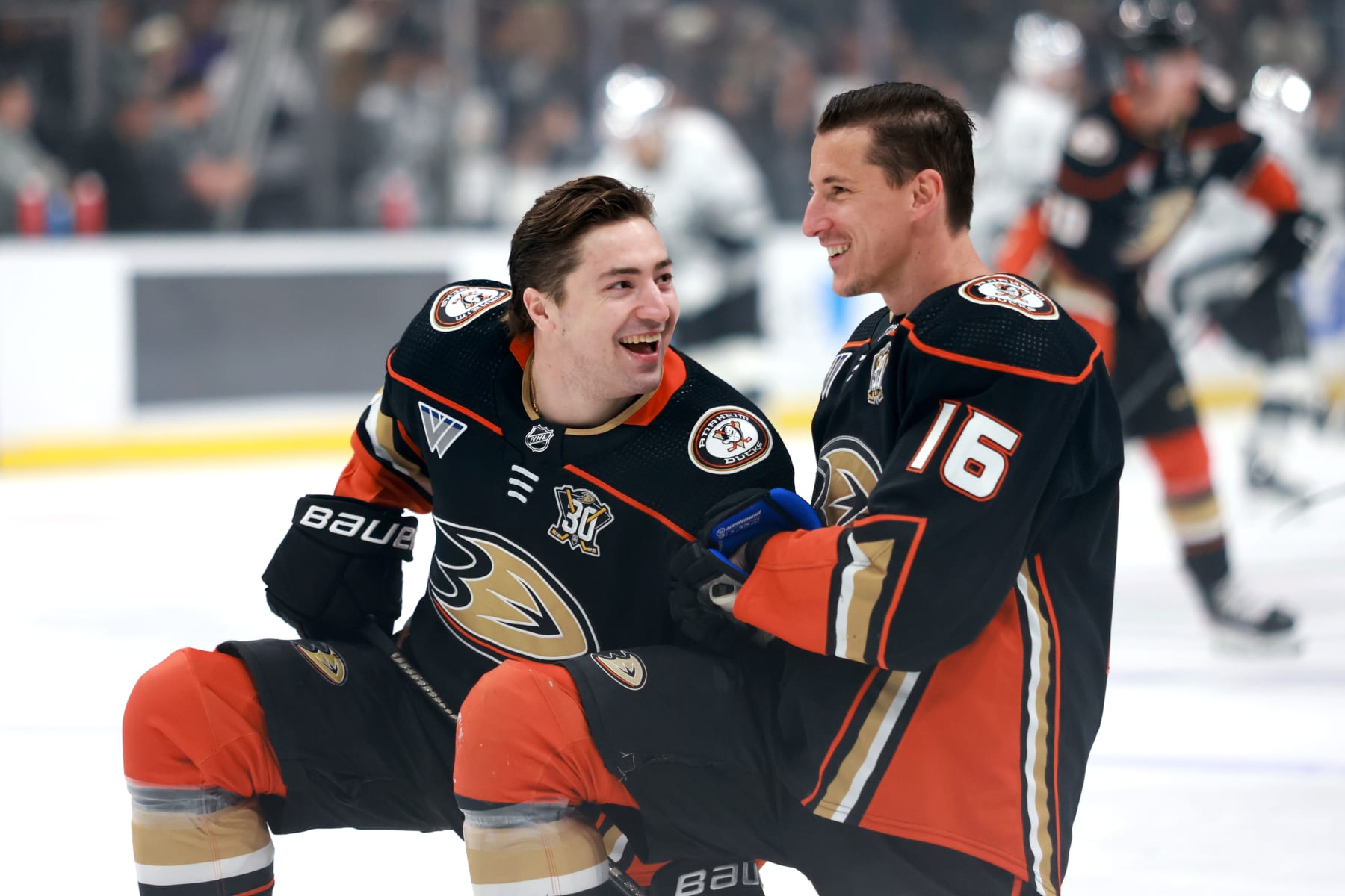 LOS ANGELES, CALIFORNIA - APRIL 13: Frank Vatrano #77 and Ryan Strome #16 of the Anaheim Ducks smile at warmups before the game against the Los Angeles Kings at Crypto.com Arena on April 13, 2024 in Los Angeles, California. (Photo by Nicole Vasquez/NHLI via Getty Images)