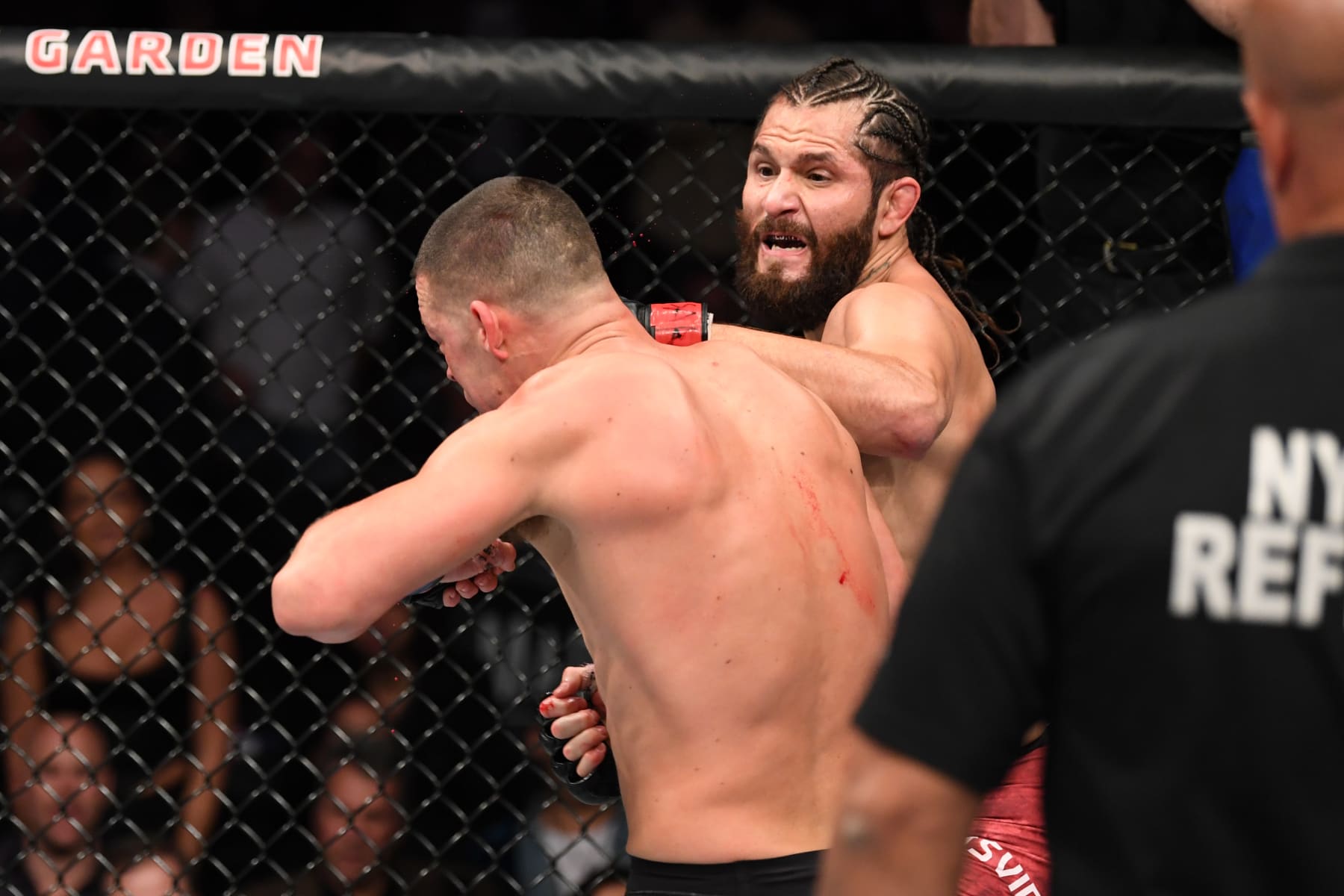 NEW YORK, NEW YORK - NOVEMBER 02: (R-L) Jorge Masvidal punches Nate Diaz in their welterweight bout for the BMF title during the UFC 244 event at Madison Square Garden on November 02, 2019 in New York City. (Photo by Josh Hedges/Zuffa LLC via Getty Images)