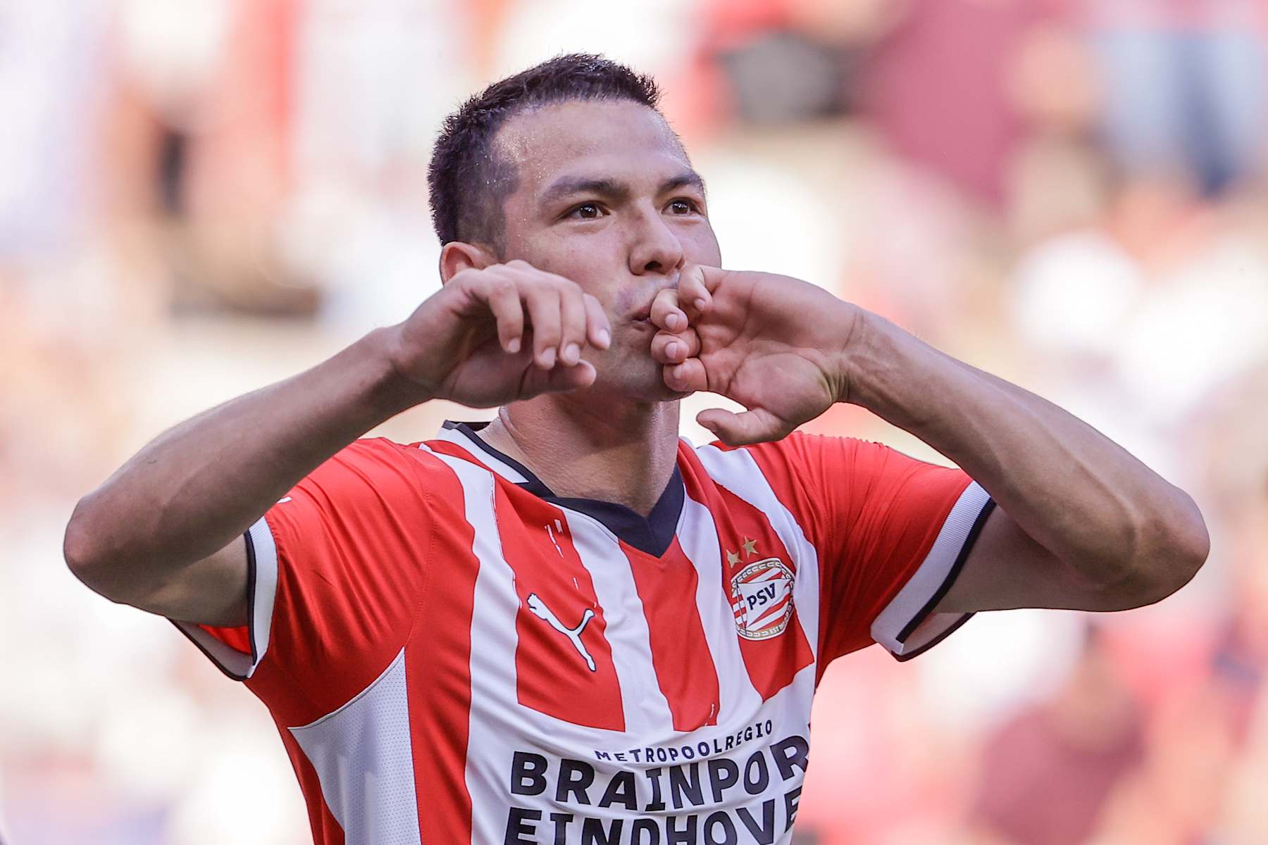 EINDHOVEN, NETHERLANDS - SEPTEMBER 1: Hirving Lozano of PSV celebrates after scoring his teams second goal during a Dutch Eredivisie match between PSV and Go Ahead Eagles at Philips Stadion on September 1, 2024 in Eindhoven, Netherlands. (Photo by Broer van den Boom/BSR Agency/Getty Images)