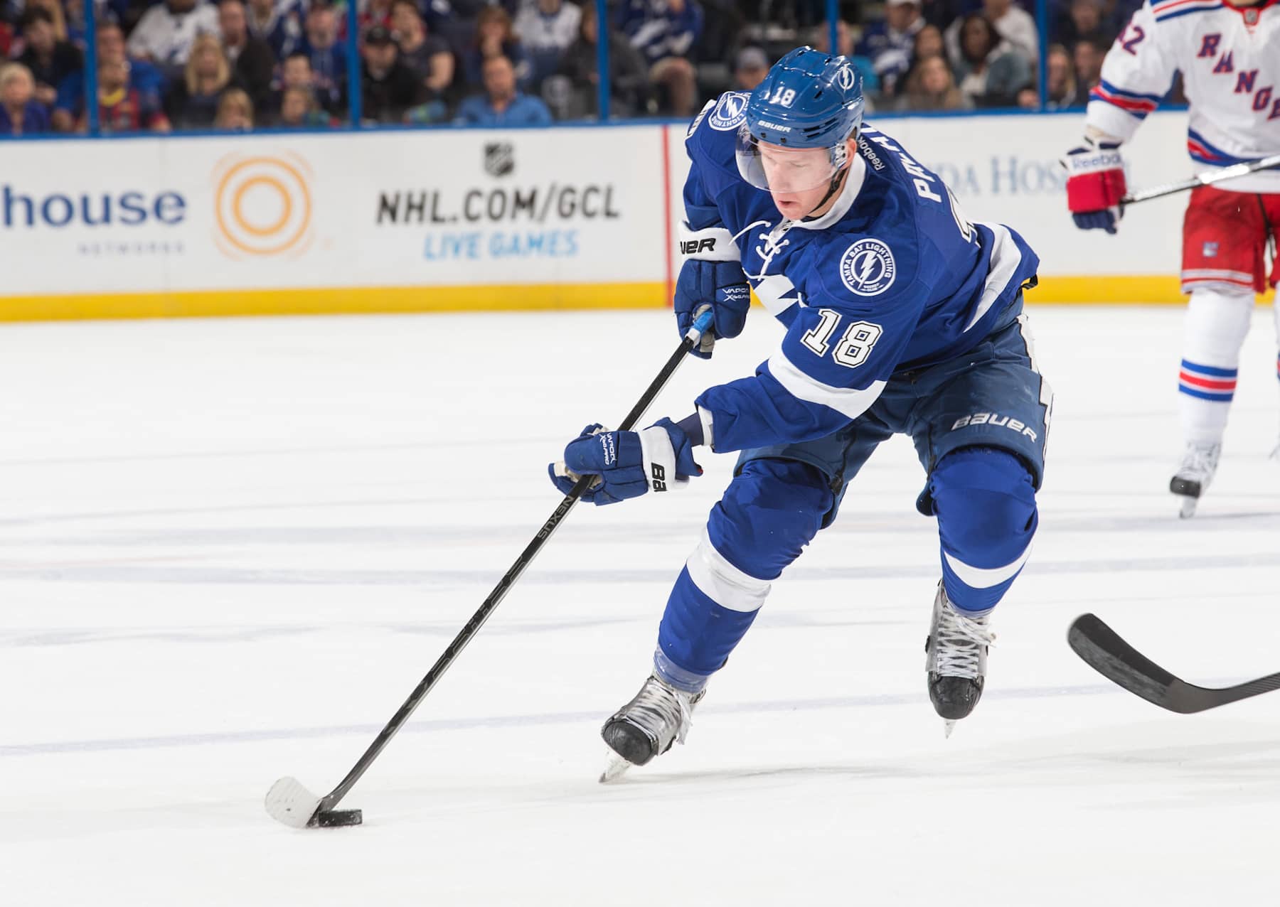 TAMPA, FL - DECEMBER 29:   Ondrej Palat #18 of the Tampa Bay Lightning skates with the puck against the New York Rangers at the Tampa Bay Times Forum on December 29, 2013 in Tampa, Florida.  (Photo by Scott Audette/NHLI via Getty Images)