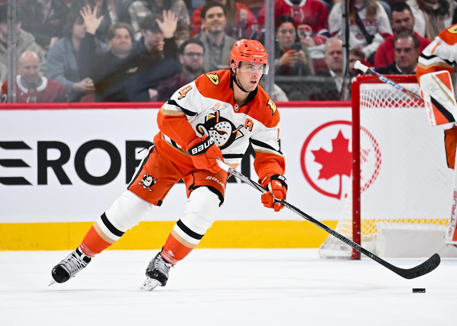 MONTREAL, CANADA - DECEMBER 09:  Cam Fowler #4 of the Anaheim Ducks skates the puck during the third period against the Montreal Canadiens at the Bell Centre on December 9, 2024 in Montreal, Quebec, Canada.  The Montreal Canadiens defeated the Anaheim Ducks 3-2 in a shootout.  (Photo by Minas Panagiotakis/Getty Images)