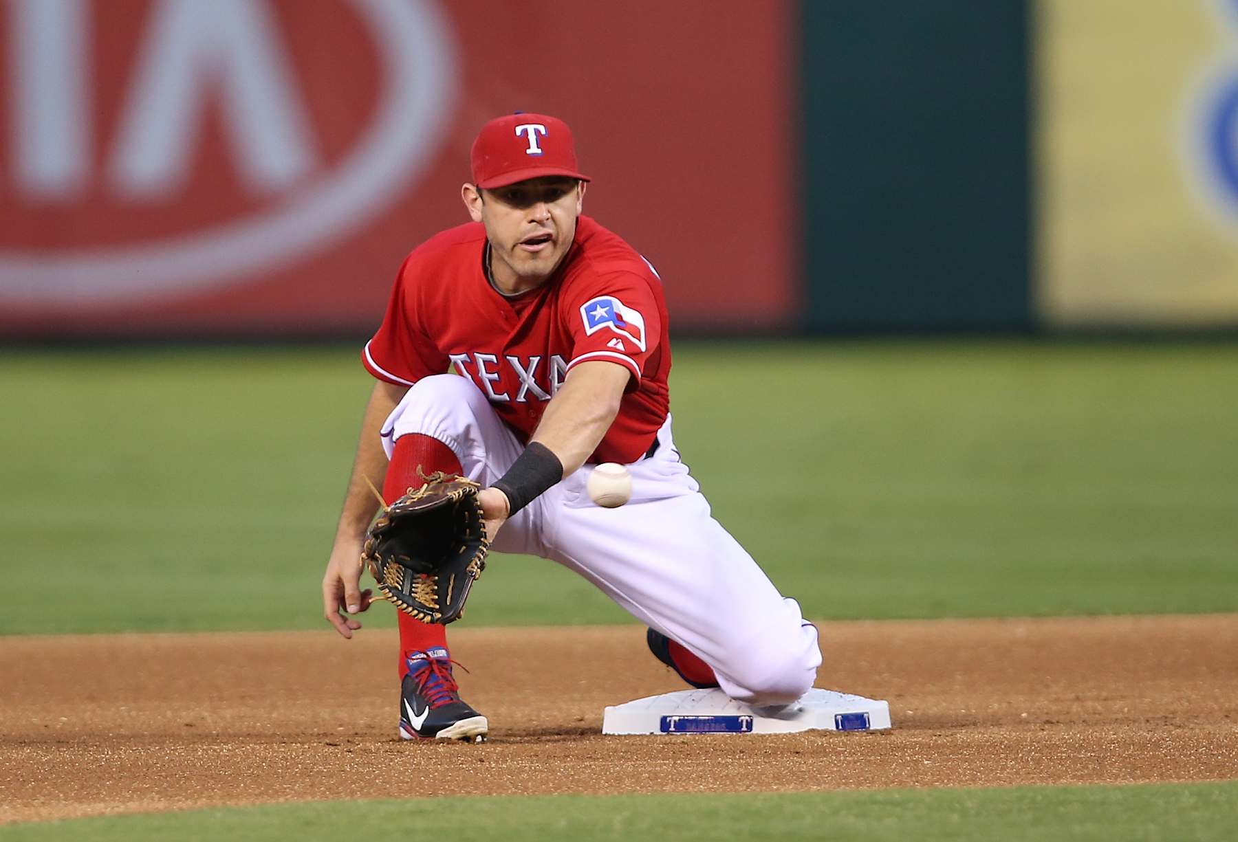 ARLINGTON, TX - SEPTEMBER 23: Ian Kinsler #5 of the Texas Rangers in action in the first inning against the Houston Astros at Rangers Ballpark on September 23, 2013 in Arlington, Texas. (Photo by Rick Yeatts/Getty Images)