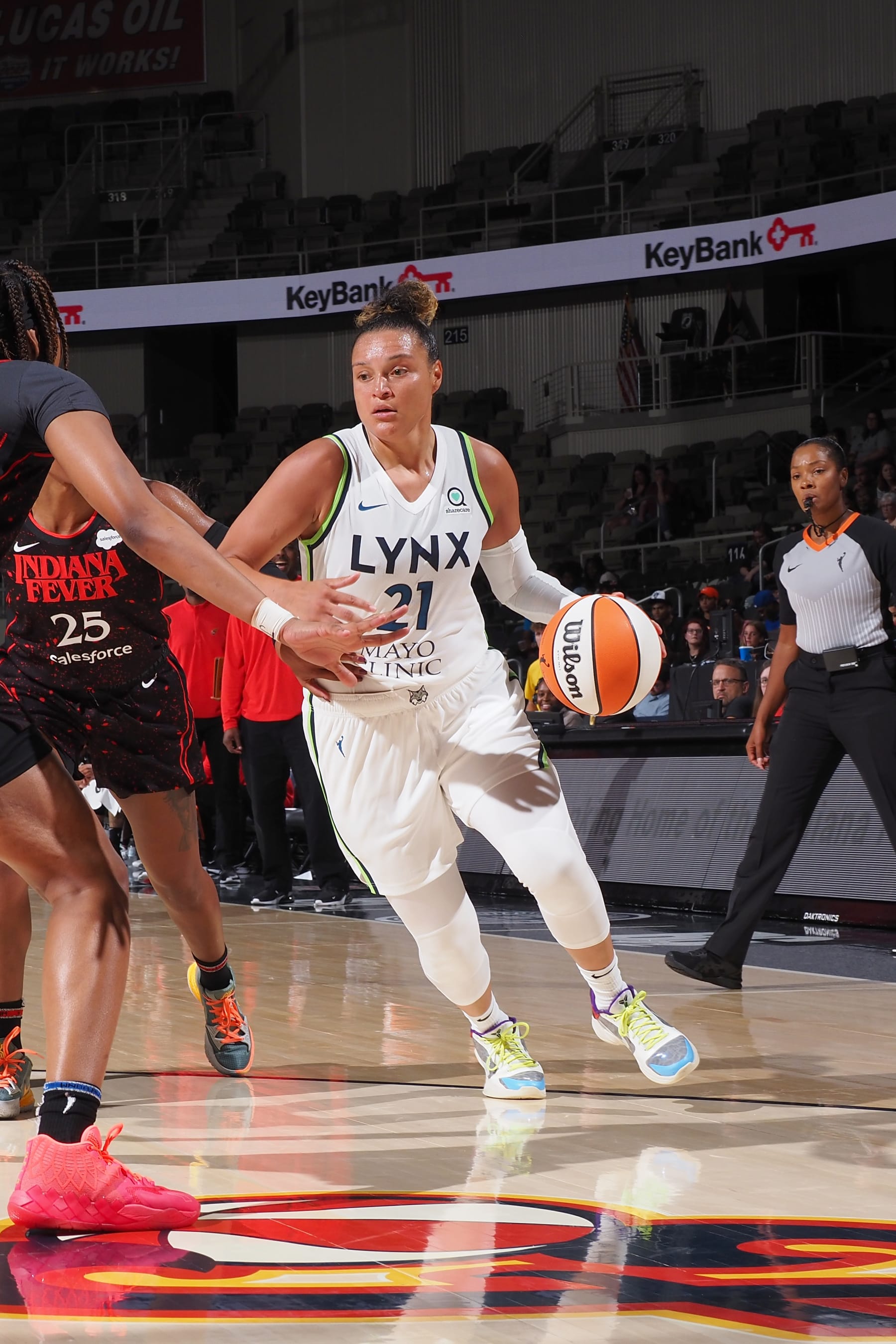 INDIANAPOLIS, IN  - JULY 15: Kayla McBride #21 of the Minnesota Lynx drives to the basket during the game against the LA Clippers on July 15, 2022 at Gainbridge Fieldhouse in Indianapolis, Indiana. NOTE TO USER: User expressly acknowledges and agrees that, by downloading and or using this Photograph, user is consenting to the terms and conditions of the Getty Images License Agreement. Mandatory Copyright Notice: Copyright 2022 NBAE (Photo by Ron Hoskins/NBAE via Getty Images)