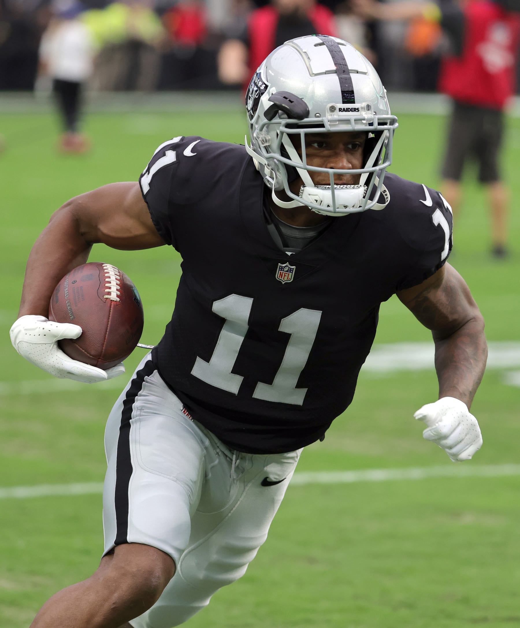 LAS VEGAS, NEVADA - AUGUST 14: Wide receiver Demarcus Robinson #11 of the Las Vegas Raiders warms up before a preseason game against the Minnesota Vikings at Allegiant Stadium on August 14, 2022 in Las Vegas, Nevada. The Raiders defeated Vikings the 26-20. (Photo by Ethan Miller/Getty Images)