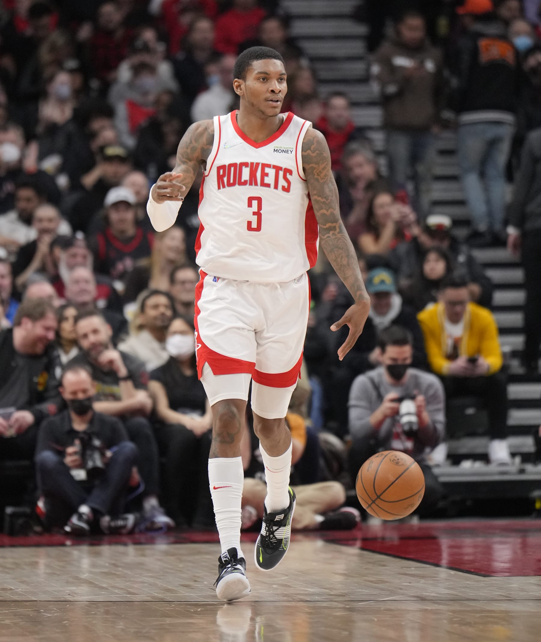 TORONTO, ON - APRIL 8: Kevin Porter Jr. #3 of the Houston Rockets dribbles against the Toronto Raptors during the first half of their basketball game at the Scotiabank Arena on April 8, 2022 in Toronto, Ontario, Canada. NOTE TO USER: User expressly acknowledges and agrees that, by downloading and/or using this Photograph, user is consenting to the terms and conditions of the Getty Images License Agreement. (Photo by Mark Blinch/Getty Images)