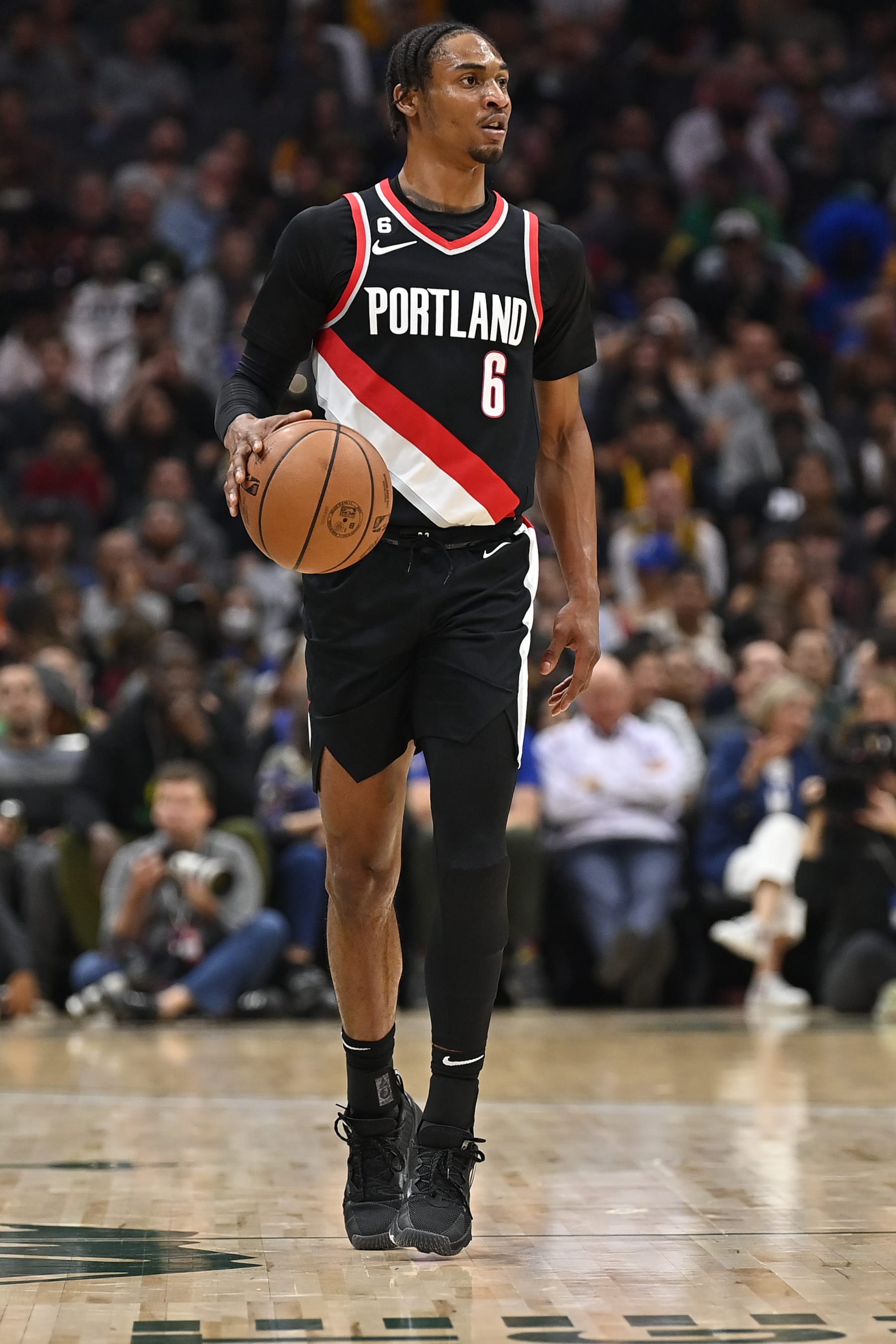 SEATTLE, WASHINGTON - OCTOBER 03: Keon Johnson #6 of the Portland Trail Blazers brings the ball up court during the first half of a preseason game against the Los Angeles Clippers at Climate Pledge Arena on October 03, 2022 in Seattle, Washington. The LA Clippers won 102-97. NOTE TO USER: User expressly acknowledges and agrees that, by downloading and or using this photograph, User is consenting to the terms and conditions of the Getty Images License Agreement. (Photo by Alika Jenner/Getty Images)