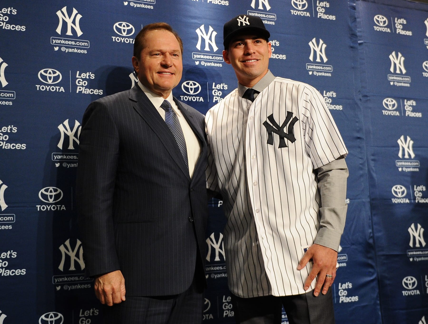 NEW YORK, NY - DECEMBER 13:  Centerfielder Jacoby Ellsbury stands with his agent Scott Boras during his introductory press conference at Yankee Stadium on December 13, 2013 in the Bronx borough of New York City.  (Photo by Maddie Meyer/Getty Images)