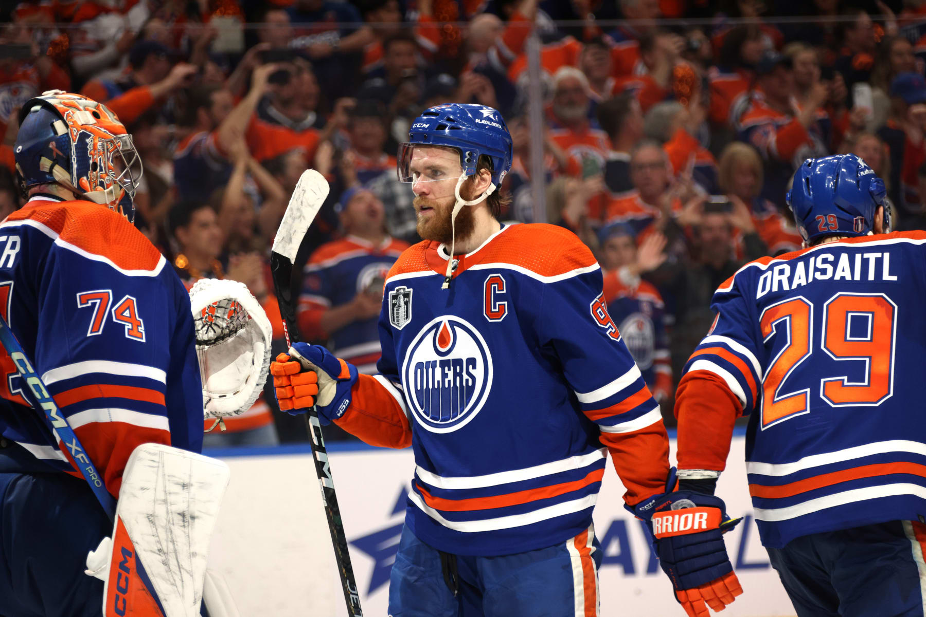 EDMONTON, ALBERTA - JUNE 21: Goaltender Stuart Skinner #74 and Connor McDavid #97 of the Edmonton Oilers celebrate after Game Six of the 2024 Stanley Cup Final between Florida Panthers and the Edmonton Oilers at Rogers Place on June 21, 2024 in Edmonton, Alberta.  (Photo by Dave Sandford/NHLI via Getty Images)