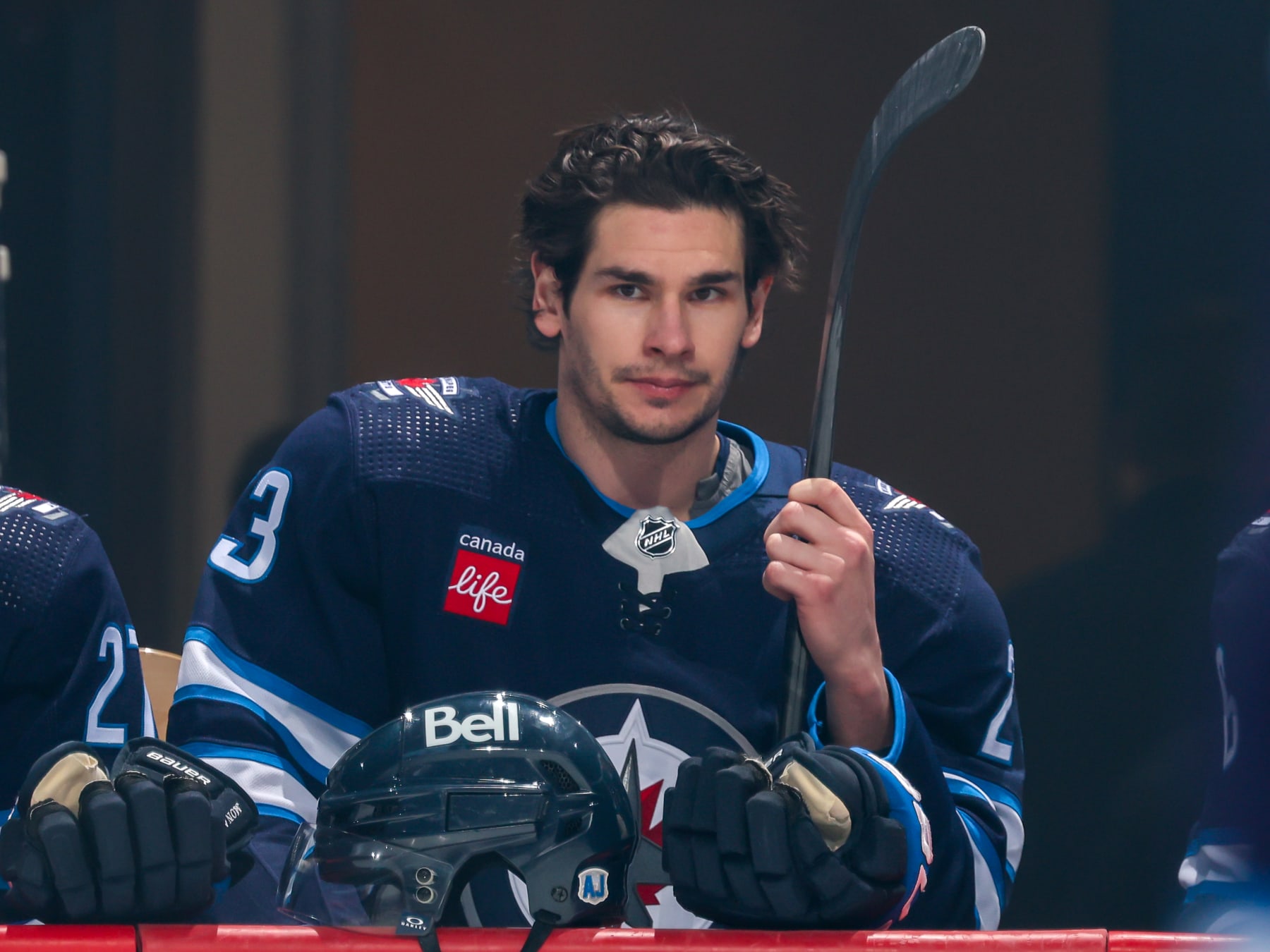 WINNIPEG, CANADA - APRIL 30: Sean Monahan #23 of the Winnipeg Jets looks on from the bench prior to NHL action against the Colorado Avalanche in Game Five of the First Round of the 2024 Stanley Cup Playoffs at Canada Life Centre on April 30, 2024 in Winnipeg, Manitoba, Canada. (Photo by Jonathan Kozub/NHLI via Getty Images)
