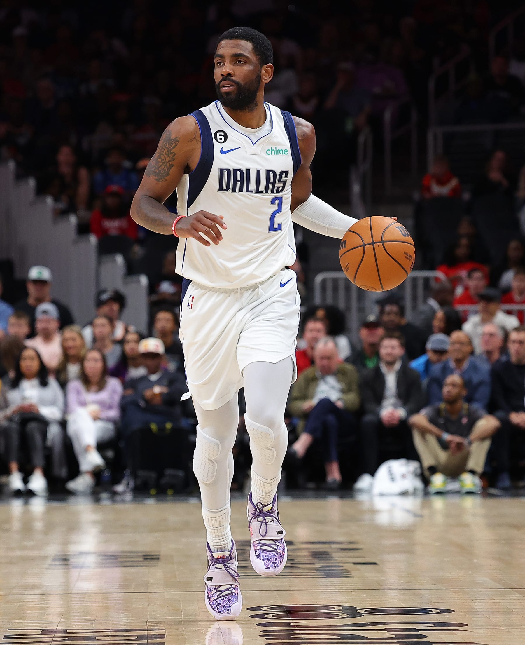 ATLANTA, GEORGIA - APRIL 02:  Kyrie Irving #2 of the Dallas Mavericks drives against the Atlanta Hawks during the second quarter at State Farm Arena on April 02, 2023 in Atlanta, Georgia.  NOTE TO USER: User expressly acknowledges and agrees that, by downloading and or using this photograph, User is consenting to the terms and conditions of the Getty Images License Agreement.  (Photo by Kevin C. Cox/Getty Images)
