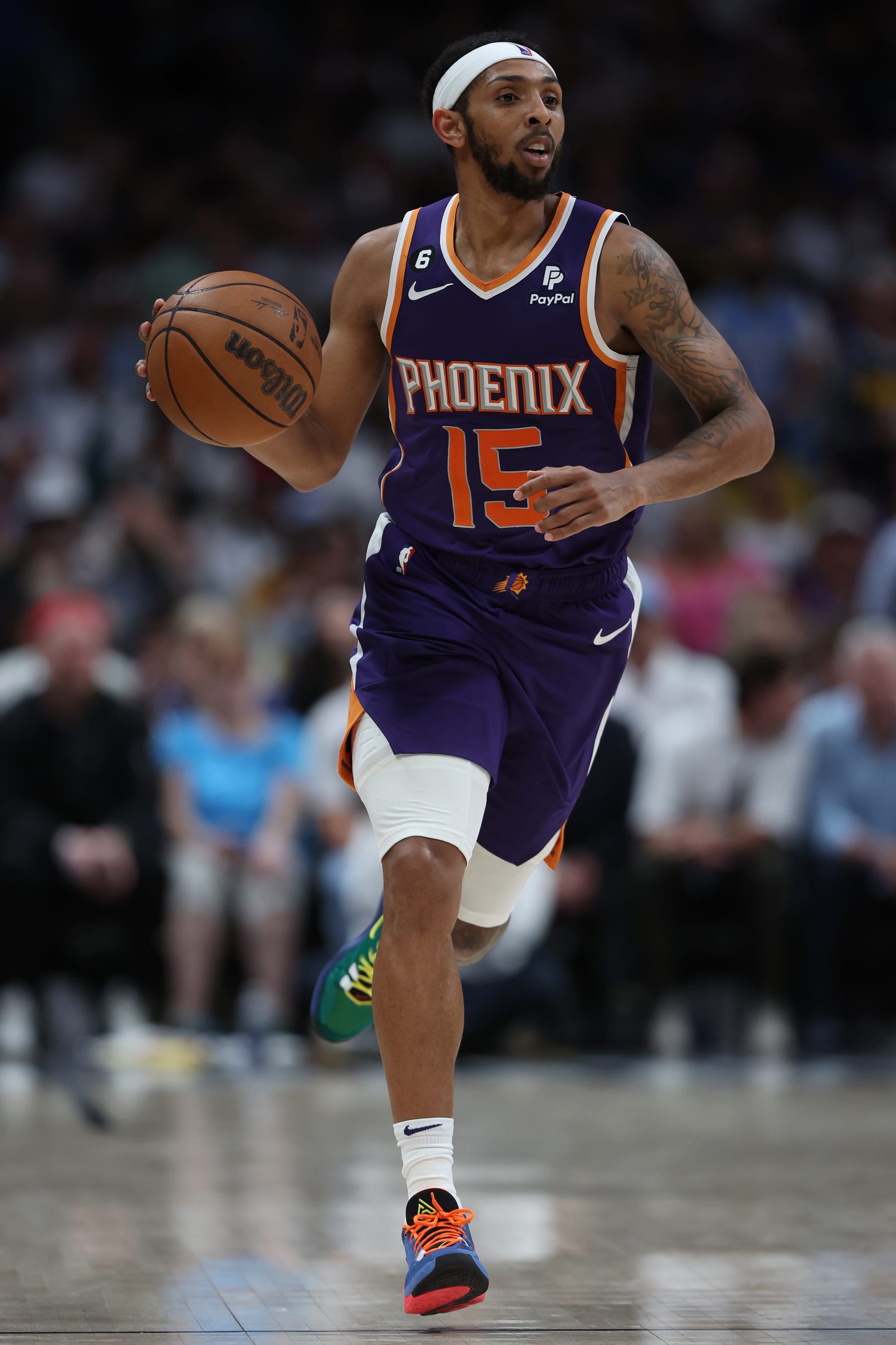 DENVER, COLORADO - MAY 09:  Cameron Payne #15 of the Phoenix Suns brings the ball down the court against the Denver Nuggets in the fourth quarter during Game Five of the NBA Western Conference Semifinals at Ball Arena on May 09, 2023 in Denver, Colorado. NOTE TO USER: User expressly acknowledges and agrees that, by downloading and/or using this photograph, User is consenting to the terms and conditions of the Getty Images License Agreement. (Photo by Matthew Stockman/Getty Images)