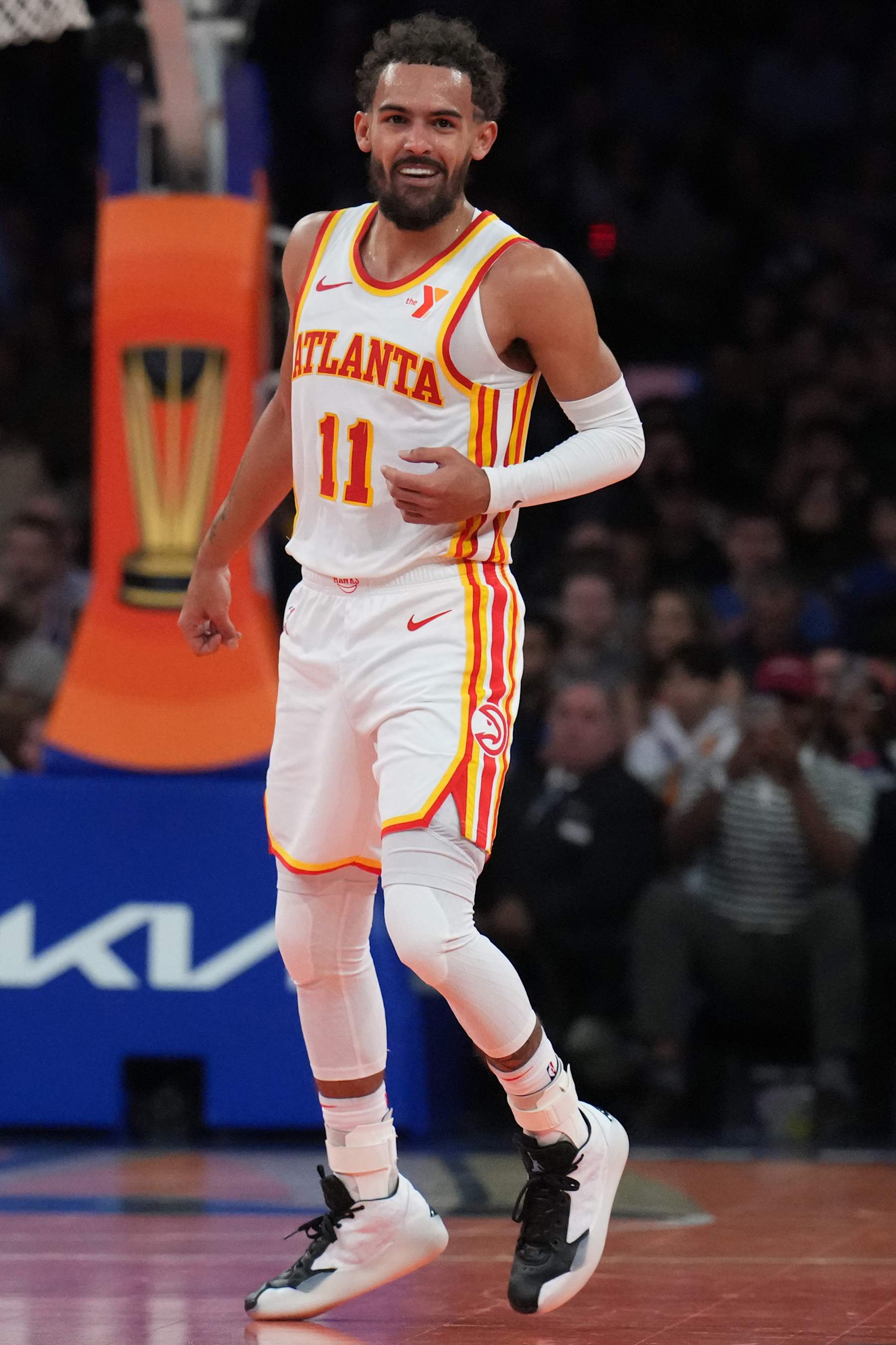 NEW YORK, NY - DECEMBER 11: Trae Young #11 of the Atlanta Hawks smiles during the game against the New York Knicks during the Emirates NBA Cup Quarterfinals on December 11, 2024 at Madison Square Garden in New York City, New York.  NOTE TO USER: User expressly acknowledges and agrees that, by downloading and or using this photograph, User is consenting to the terms and conditions of the Getty Images License Agreement. Mandatory Copyright Notice: Copyright 2024 NBAE  (Photo by Jesse D. Garrabrant/NBAE via Getty Images)