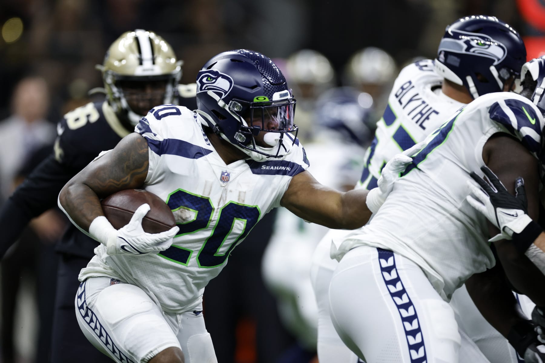 NEW ORLEANS, LOUISIANA - OCTOBER 09: Rashaad Penny #20 of the Seattle Seahawks runs with the ball against the New Orleans Saints at Caesars Superdome on October 09, 2022 in New Orleans, Louisiana. (Photo by Chris Graythen/Getty Images)