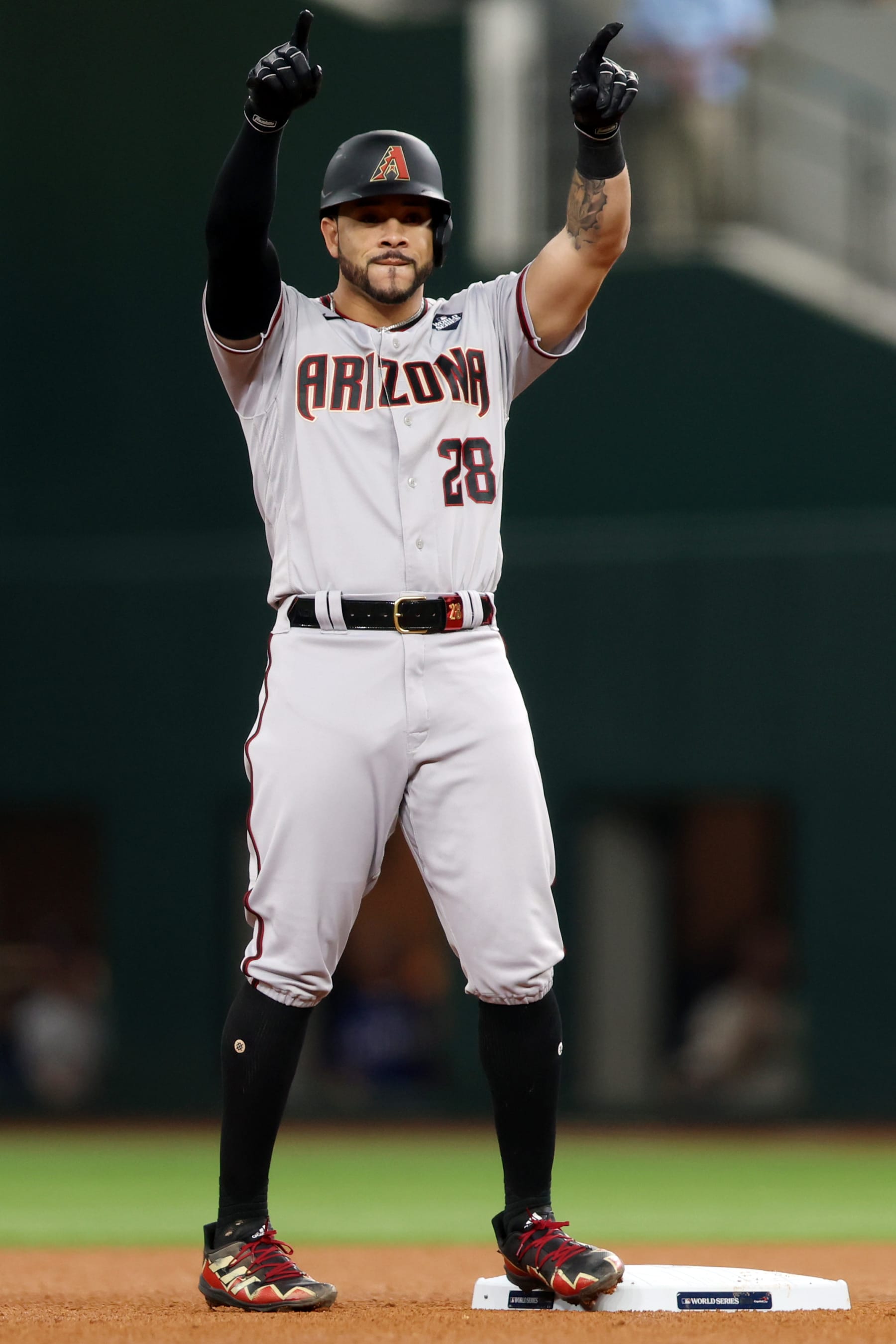 ARLINGTON, TX - OCTOBER 28:  Tommy Pham #28 of the Arizona Diamondbacks celebrates after hitting a double win the fourth inning during Game 2 of the 2023 World Series between the Arizona Diamondbacks and the Texas Rangers at Globe Life Field on Saturday, October 28, 2023 in Arlington, Texas. (Photo by Rob Tringali/MLB Photos via Getty Images)