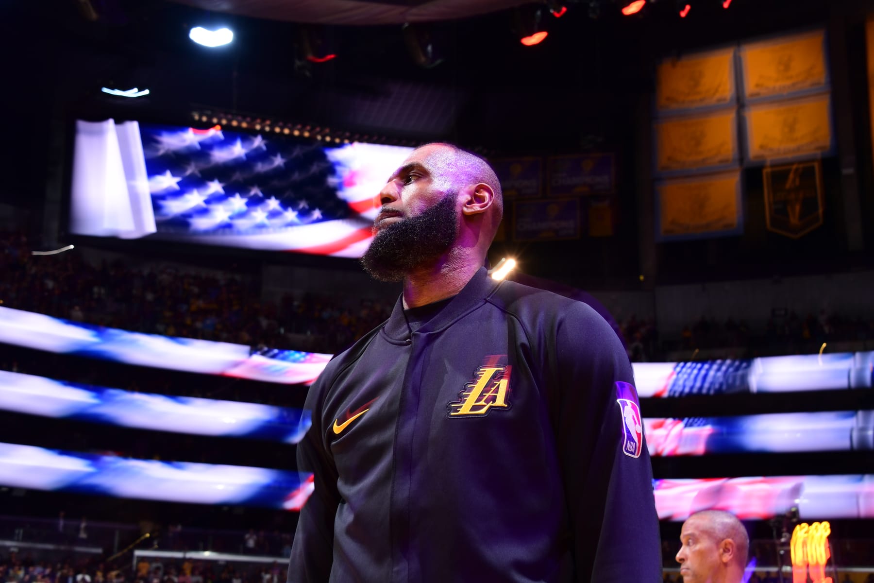 LOS ANGELES, CA - DECEMBER 18:  (EDITORS NOTE: This image was captured using a long exposure) LeBron James #23 of the Los Angeles Lakers looks on during the National Anthem on December 18, 2023 at Crypto.Com Arena in Los Angeles, California. NOTE TO USER: User expressly acknowledges and agrees that, by downloading and/or using this Photograph, user is consenting to the terms and conditions of the Getty Images License Agreement. Mandatory Copyright Notice: Copyright 2023 NBAE (Photo by Adam Pantozzi/NBAE via Getty Images)