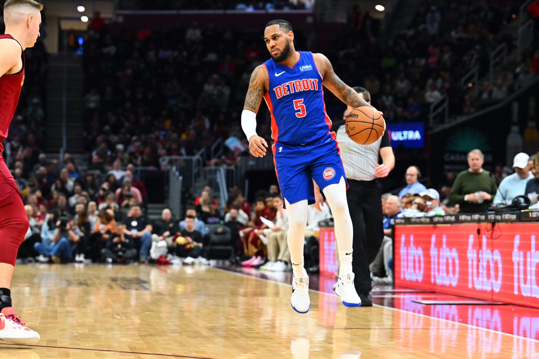 CLEVELAND, OHIO - JANUARY 31: Monte Morris #5 of the Detroit Pistons brings the ball down court during the third quarter against the Cleveland Cavaliers at Rocket Mortgage Fieldhouse on January 31, 2024 in Cleveland, Ohio. The Cavaliers defeated the Pistons 128-121. NOTE TO USER: User expressly acknowledges and agrees that, by downloading and or using this photograph, User is consenting to the terms and conditions of the Getty Images License Agreement. (Photo by Jason Miller/Getty Images)